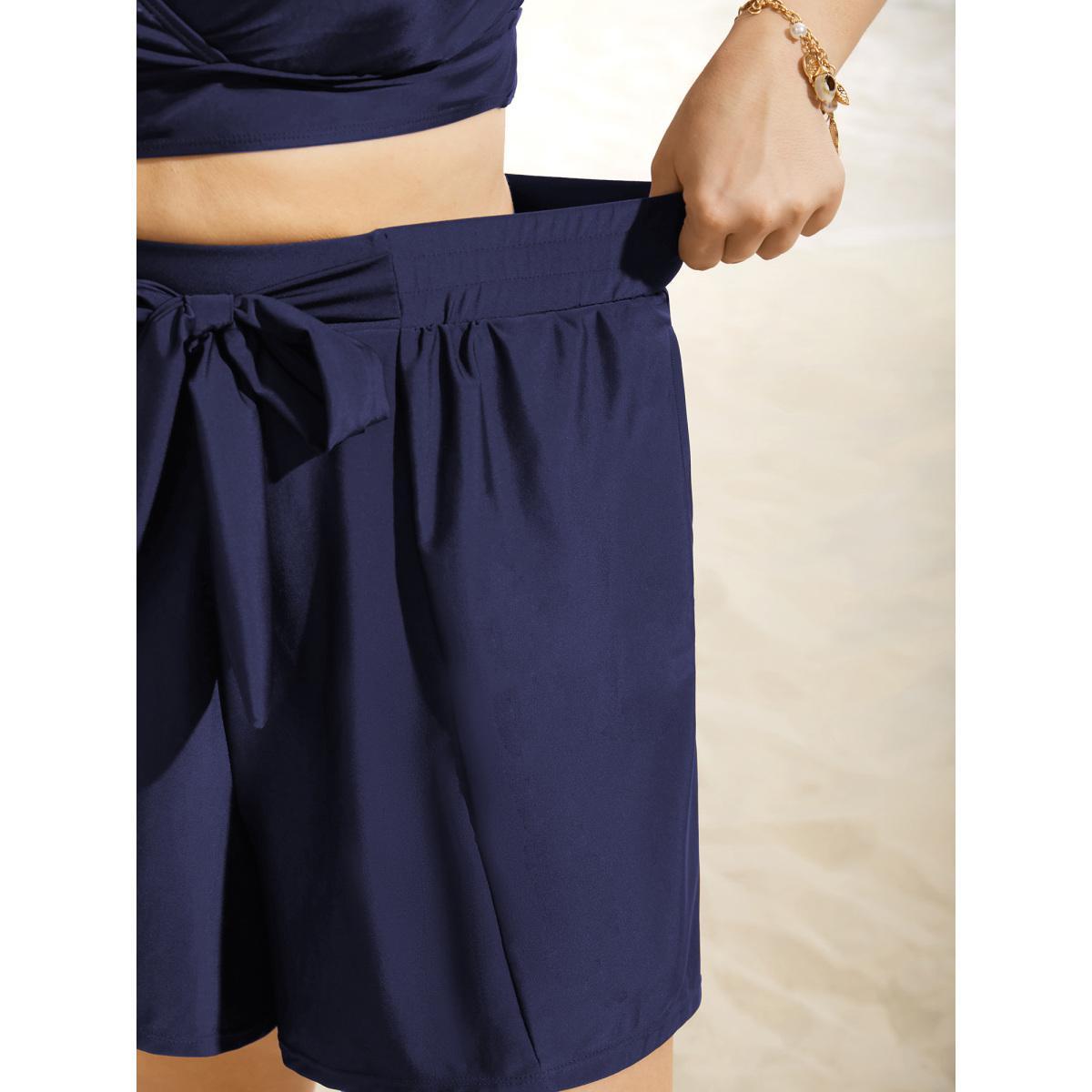 Plus Size High Rise Tie Knot Wideband Waist Swim Bottom Women's Swimwear Indigo Beach Tie knot High stretch Bodycon High Rise Side seam pocket Curve Swim Bottoms BloomChic 10/M Product Image