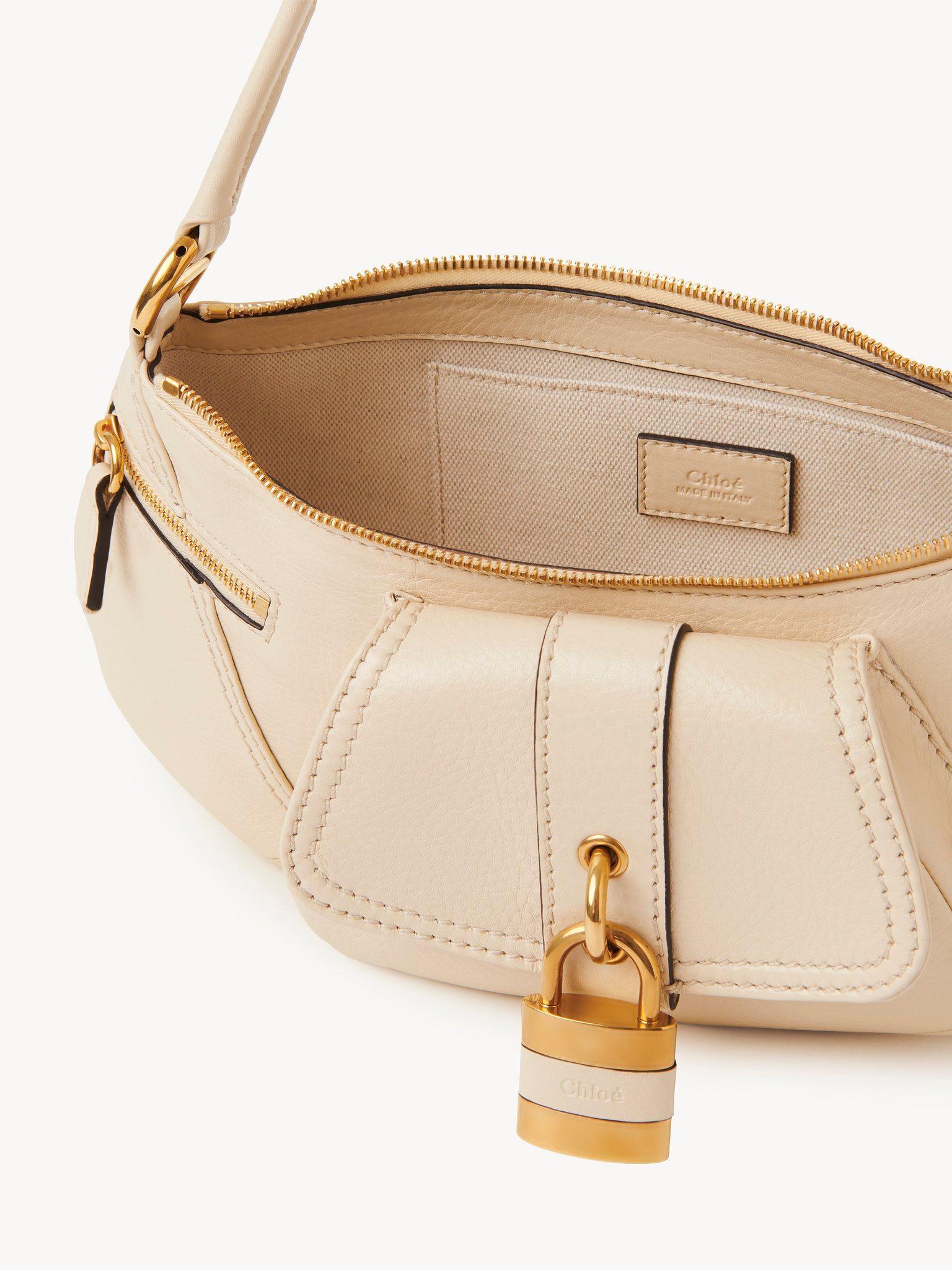 The 99 shoulder bag in grained leather Product Image