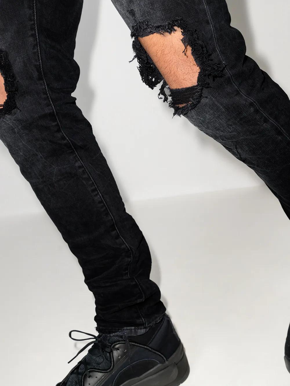 low-rise "Black Wash Blowout" slim jeans Product Image