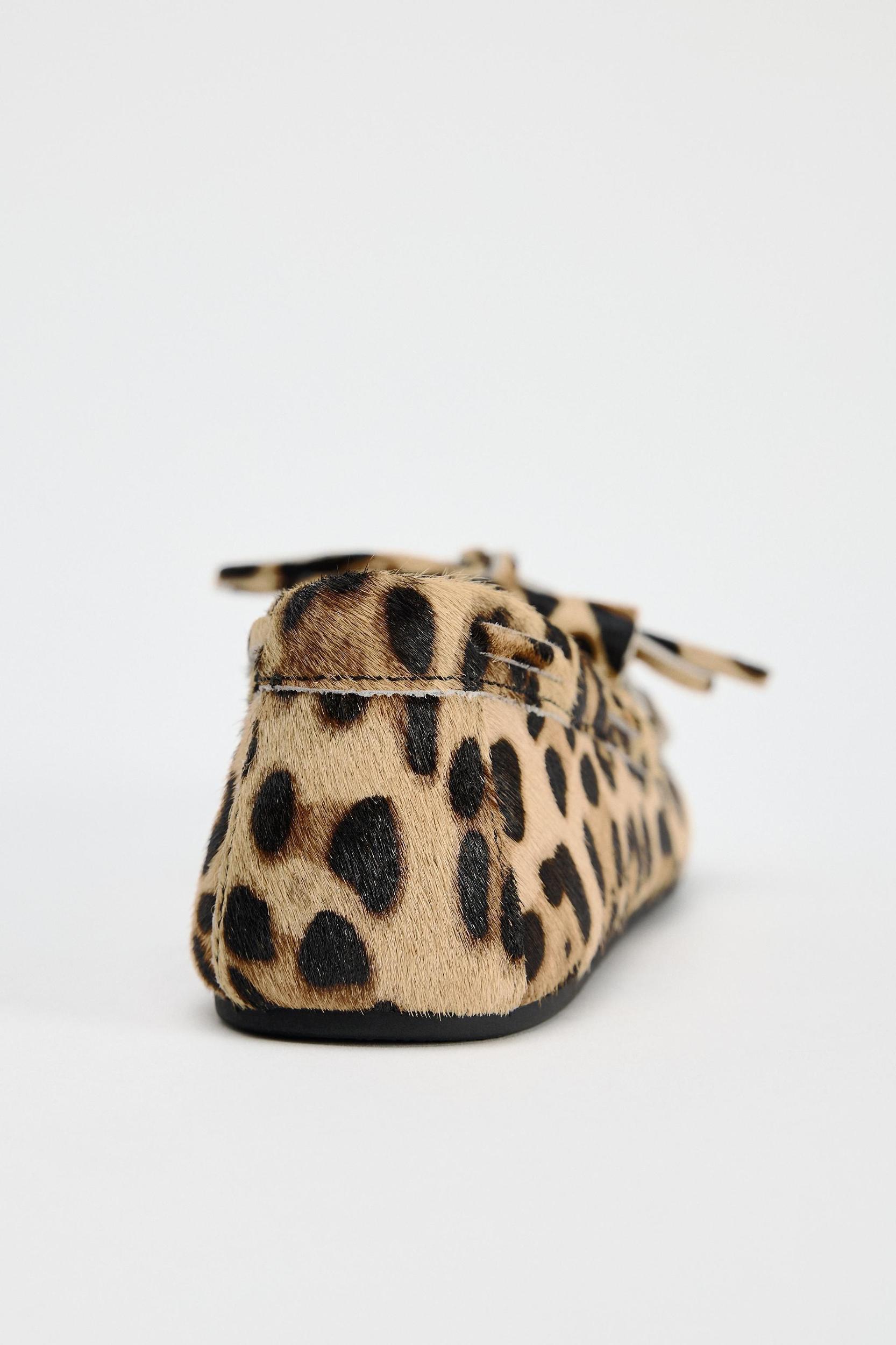 ANIMAL PRINT FUR LINED LEATHER LOAFERS Product Image