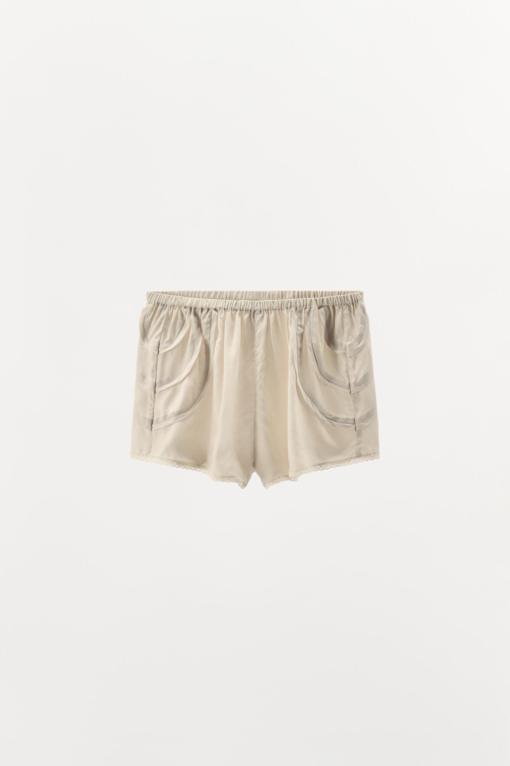PLEATED LACE SHORTS Product Image