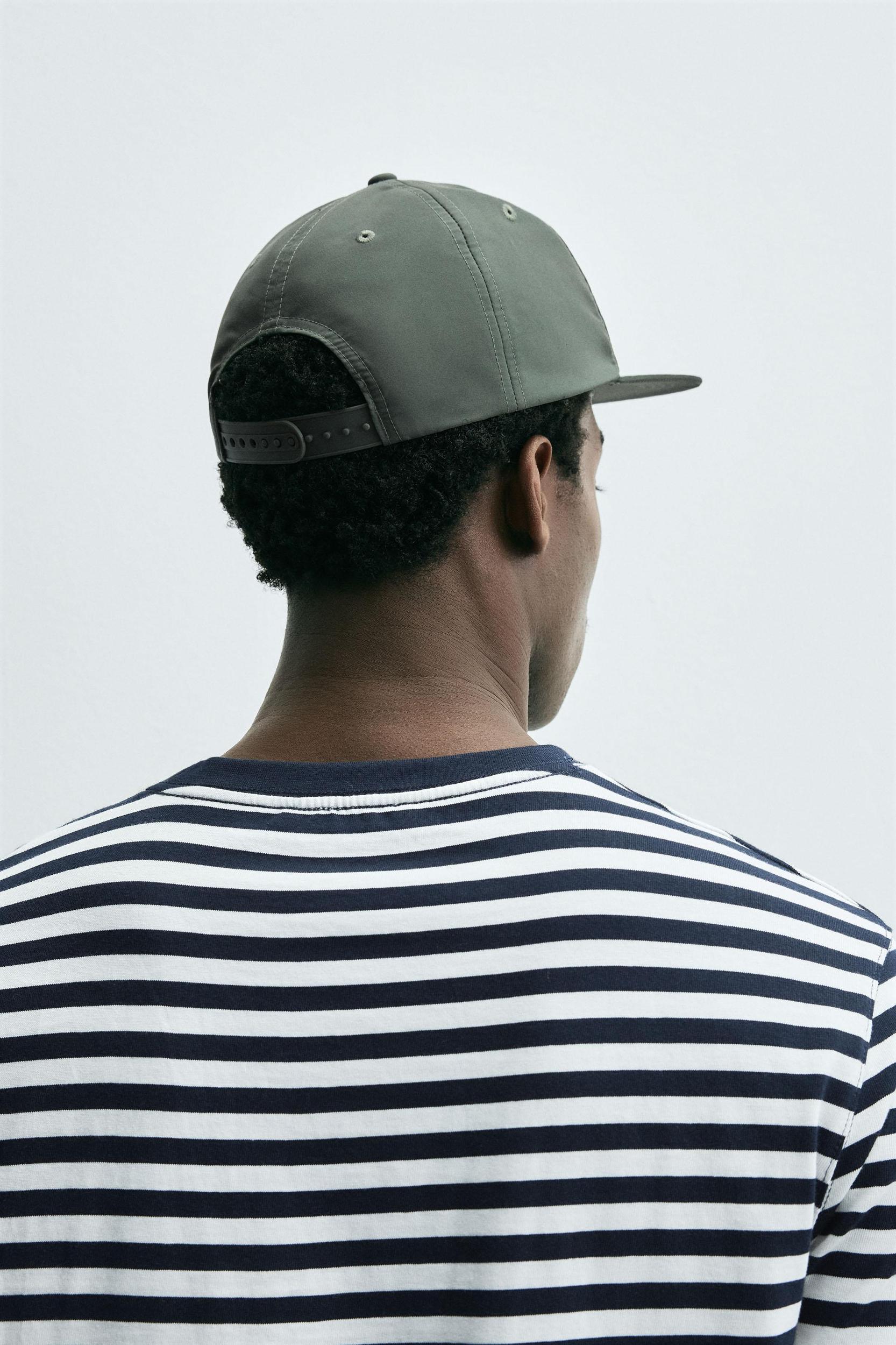 EMBROIDERED FLAT VISOR CAP Product Image