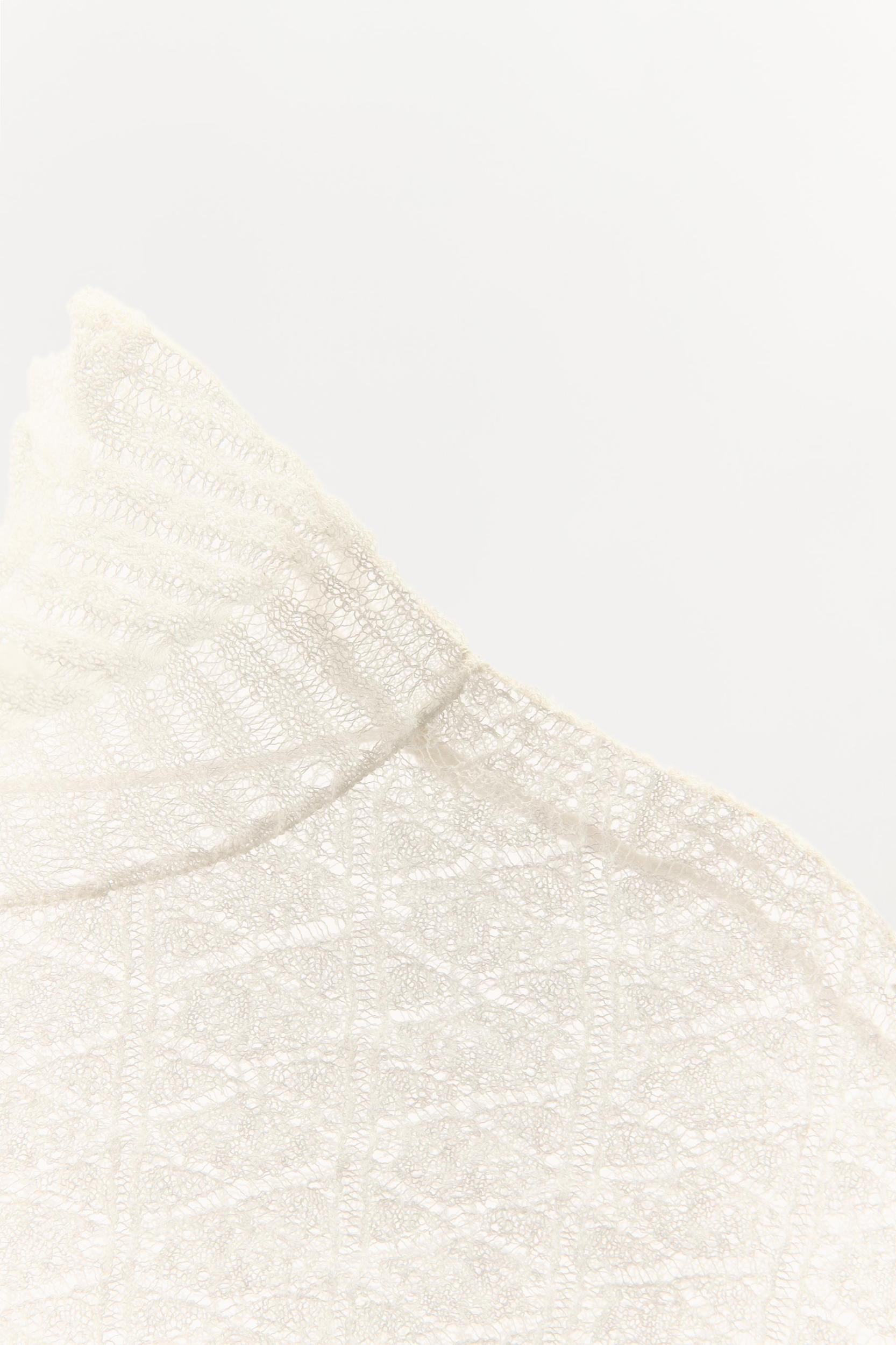 KNIT CAPE Product Image