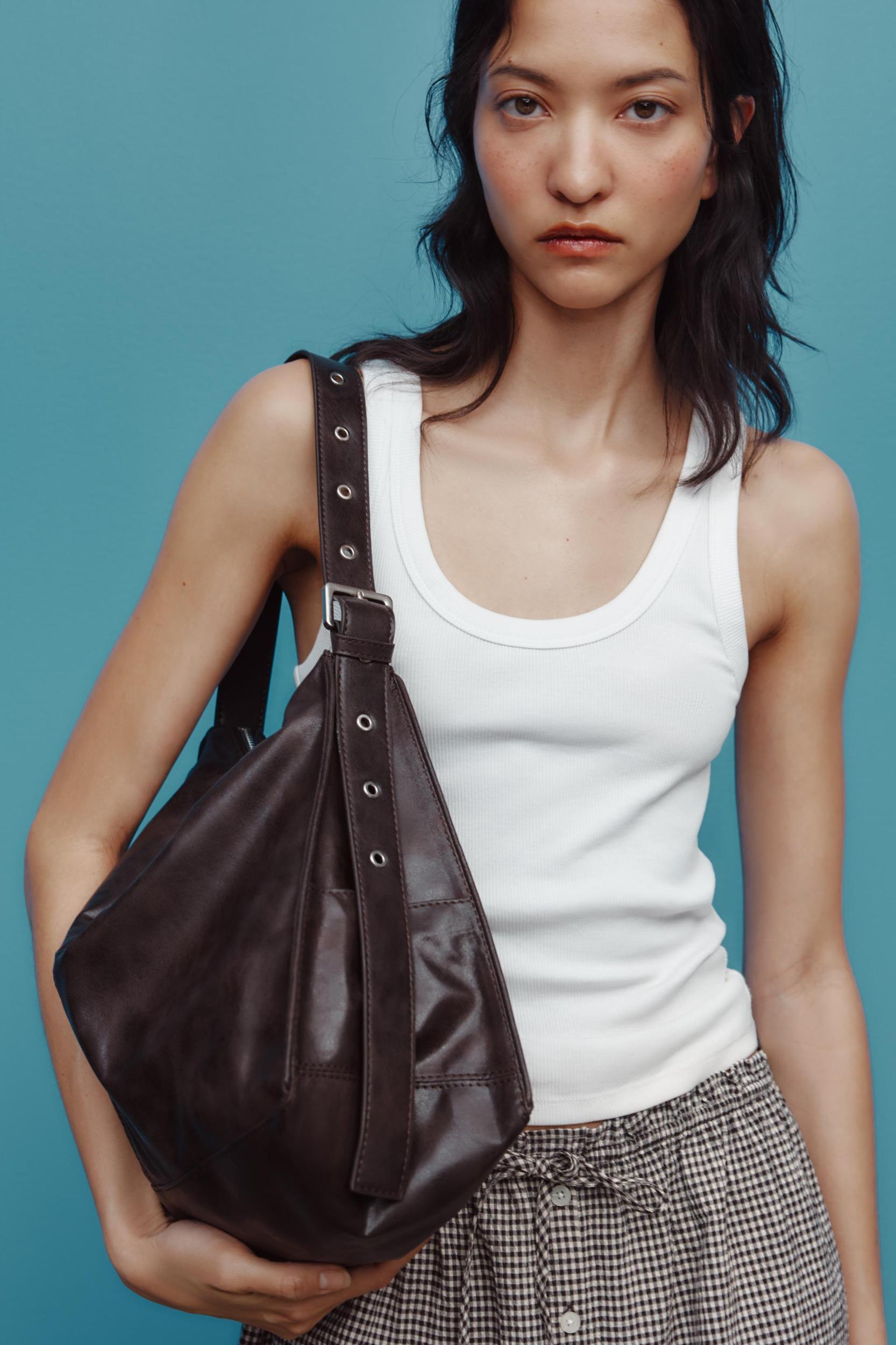 LARGE SOFT BUCKET BAG WITH METAL EYELETS Product Image