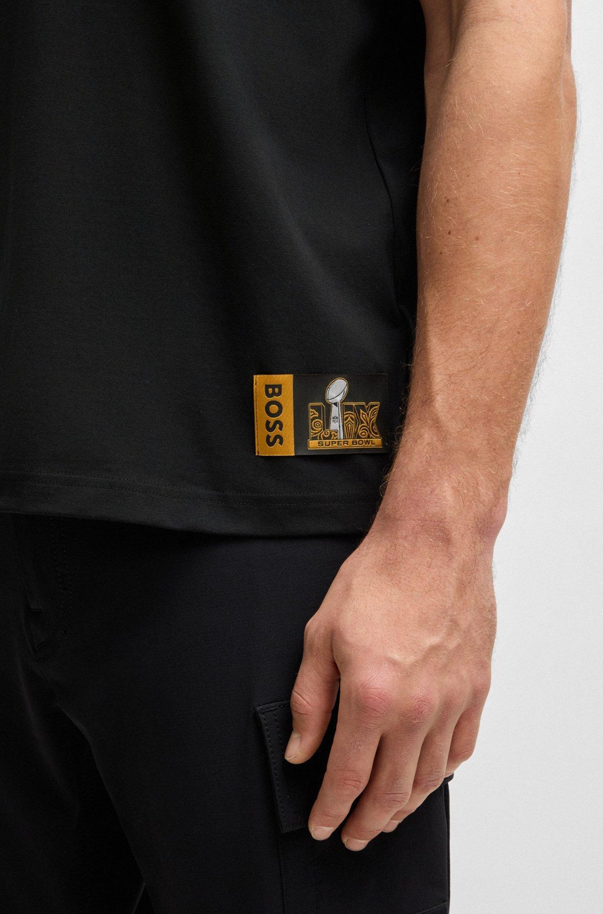 BOSS - BOSS x NFL stretch-cotton T-shirt with gold-tone artwork - Black Product Image