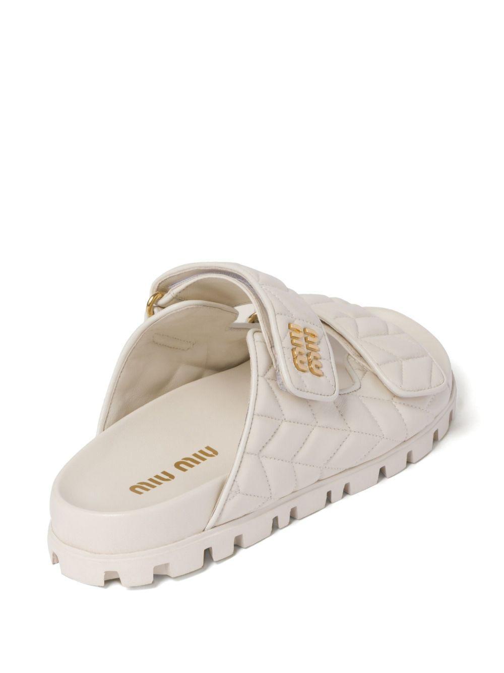 Matelassé nappa leather slides Product Image