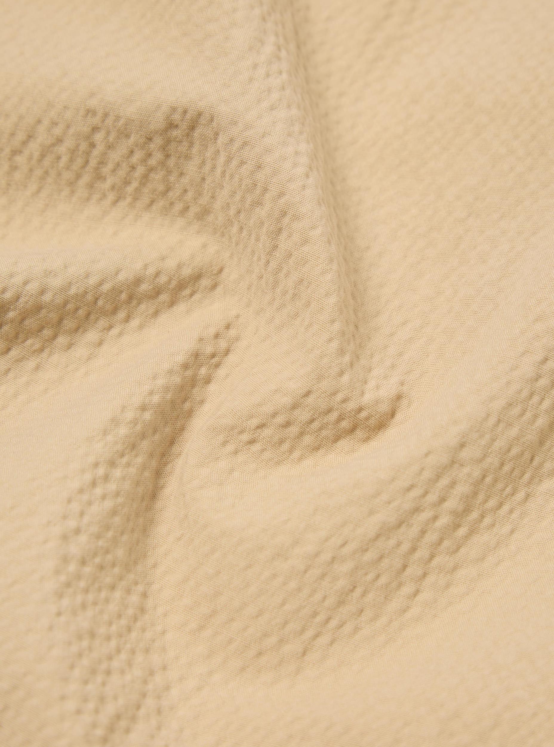 Universal Works Pleated Track Pant in Sand Seersucker II Product Image
