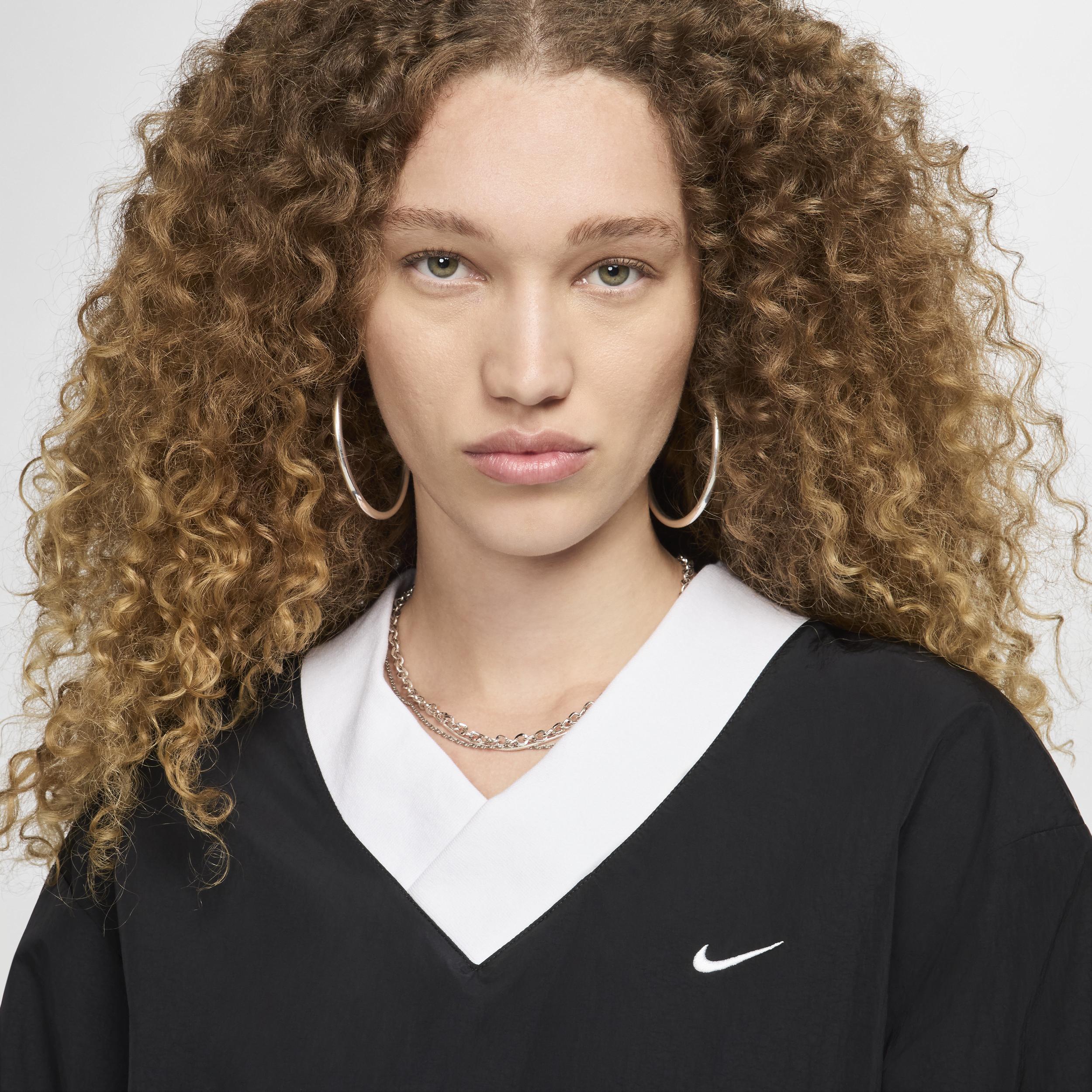 Nike Sportswear Essential Women's Loose UV Woven Long-Sleeve V-Neck Top Product Image