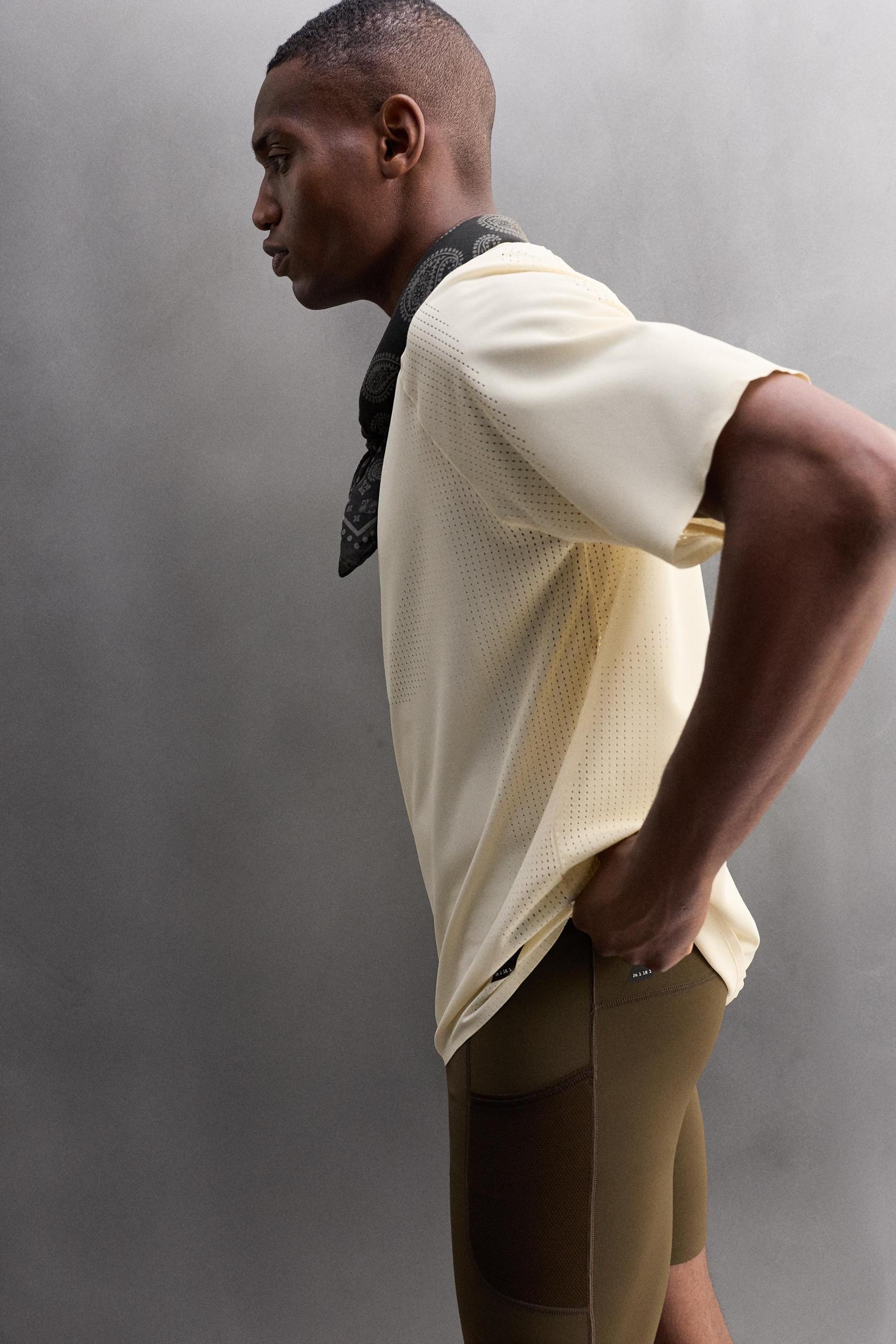 OPEN KNIT STRUCTURE T-SHIRT Product Image