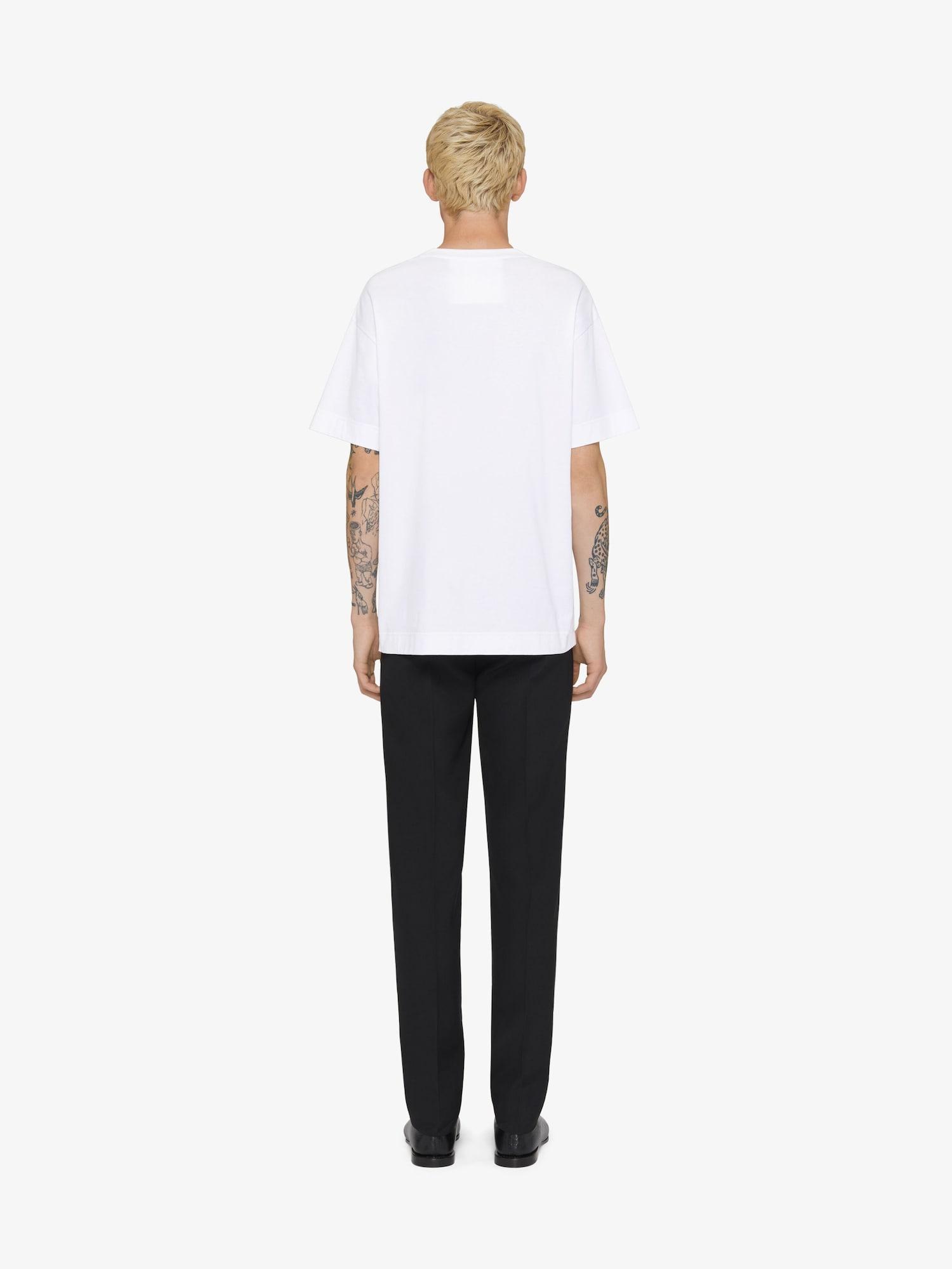 T-shirt in cotton with chandelier and snake print Product Image