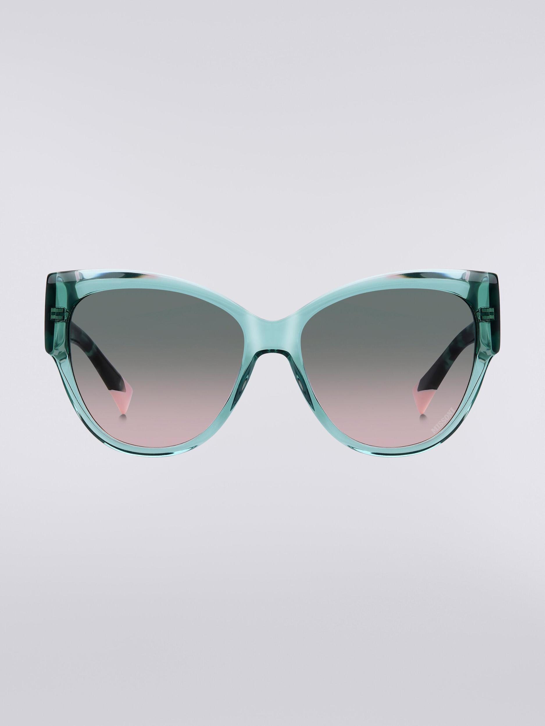 Rounded frame sunglasses with contrasting logo insert Product Image