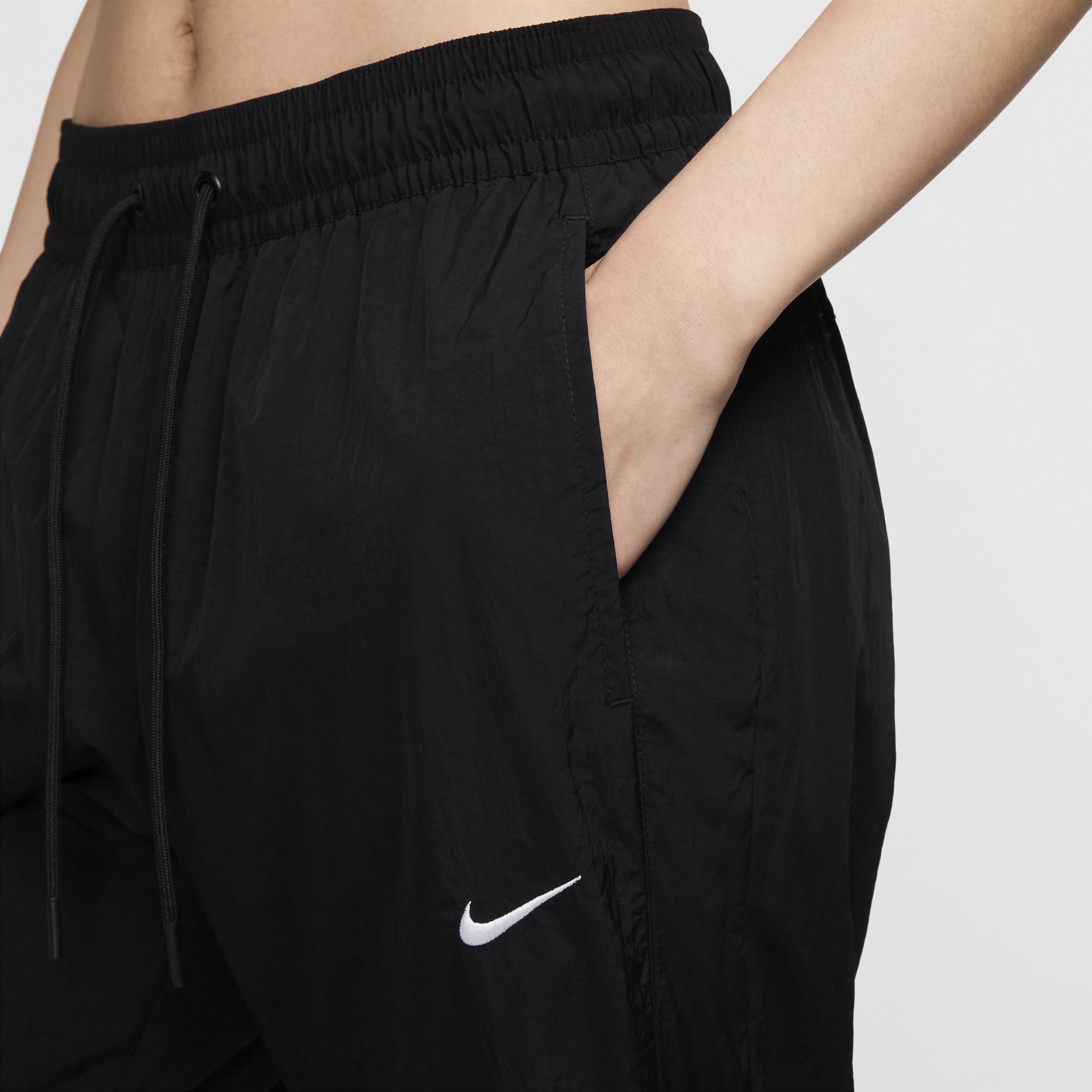 Women's Nike Sportswear Collection Mid-Rise Repel Zip Pants Product Image