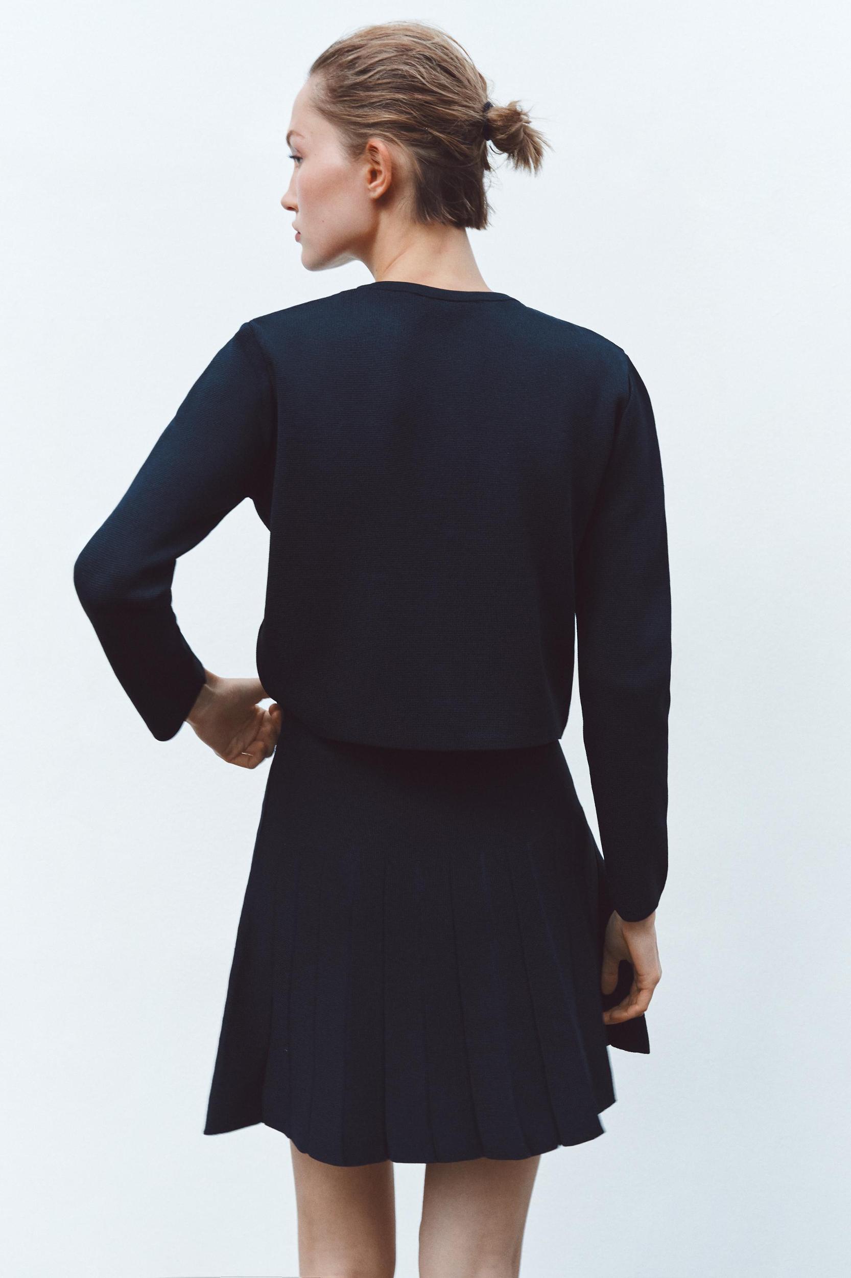BOX PLEAT KNIT MINI SKIRT Product Image