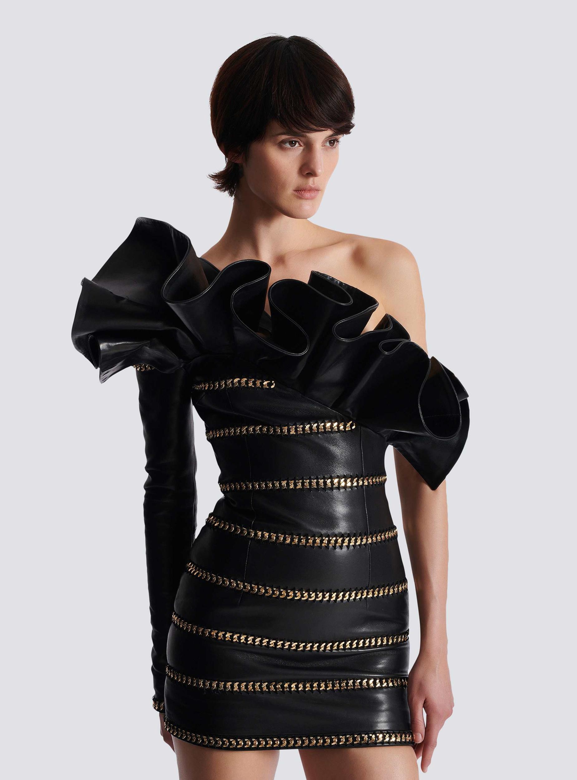 Asymmetric leather bodycon dress with chains Product Image