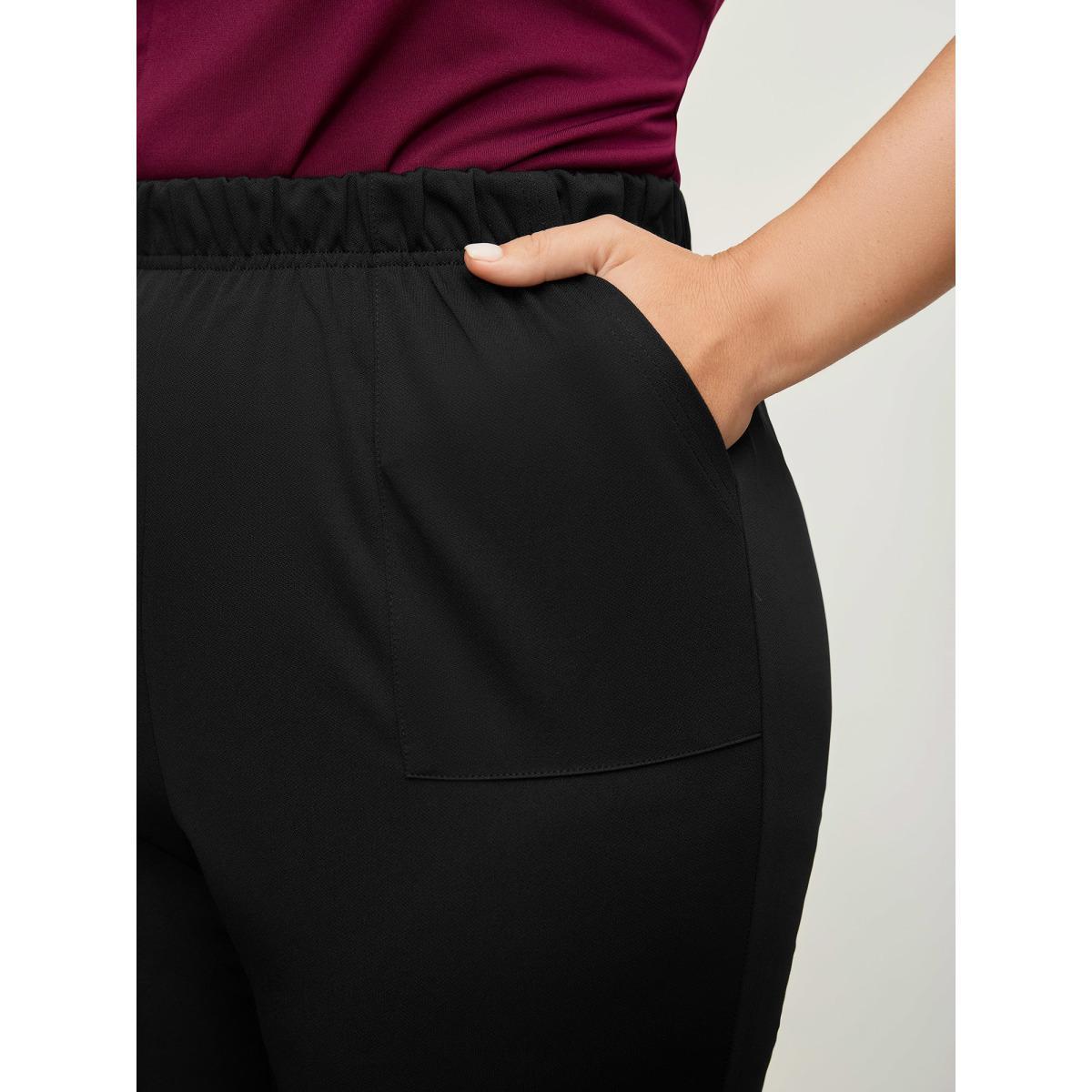 Plus Size Solid Pocket Flare Leg Elastic Waist Pants Women Black At the Office Flare Leg High Rise Work Pants BloomChic 14-16/1X Product Image