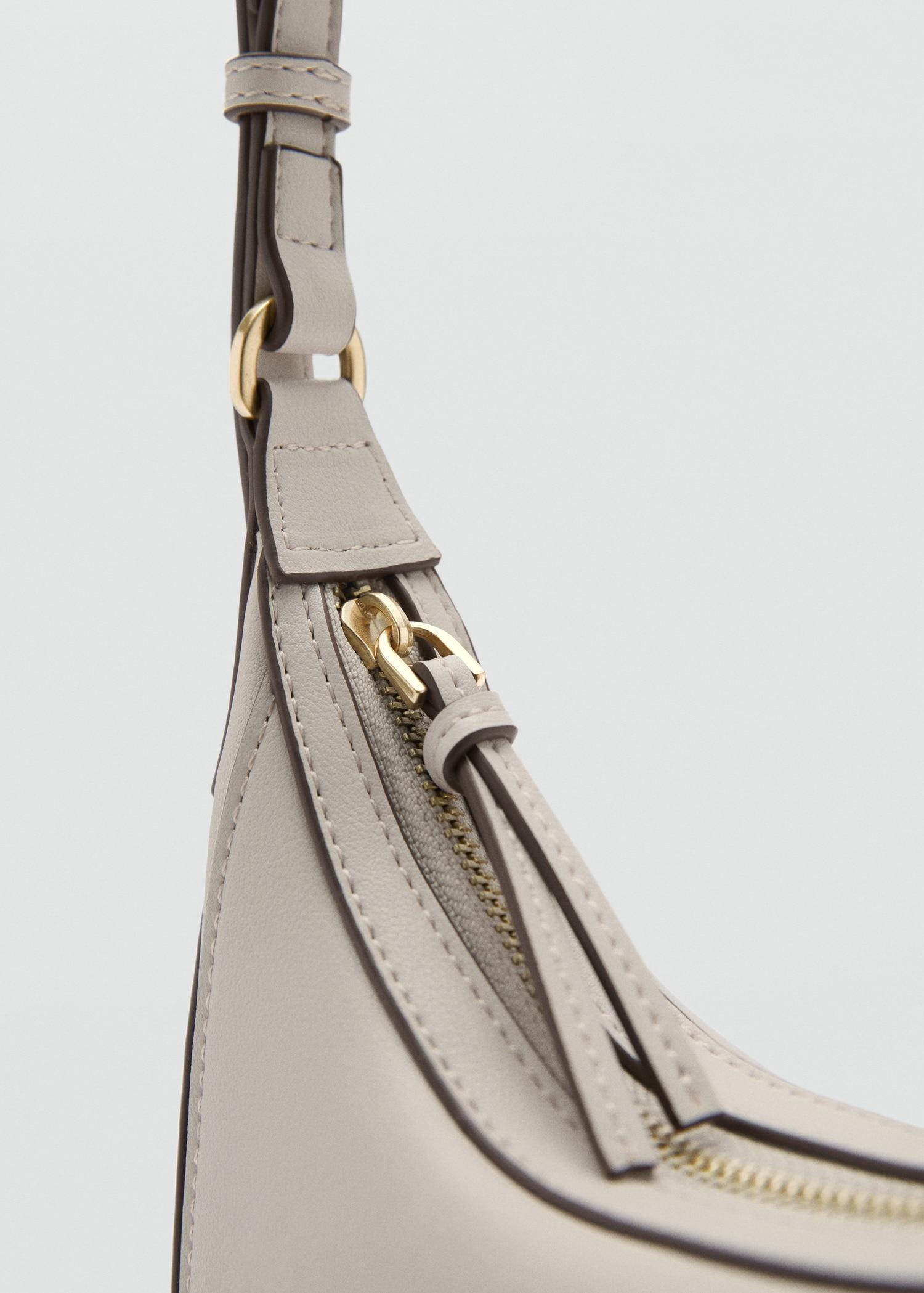 Oval shoulder bag - Women | MANGO USA Product Image