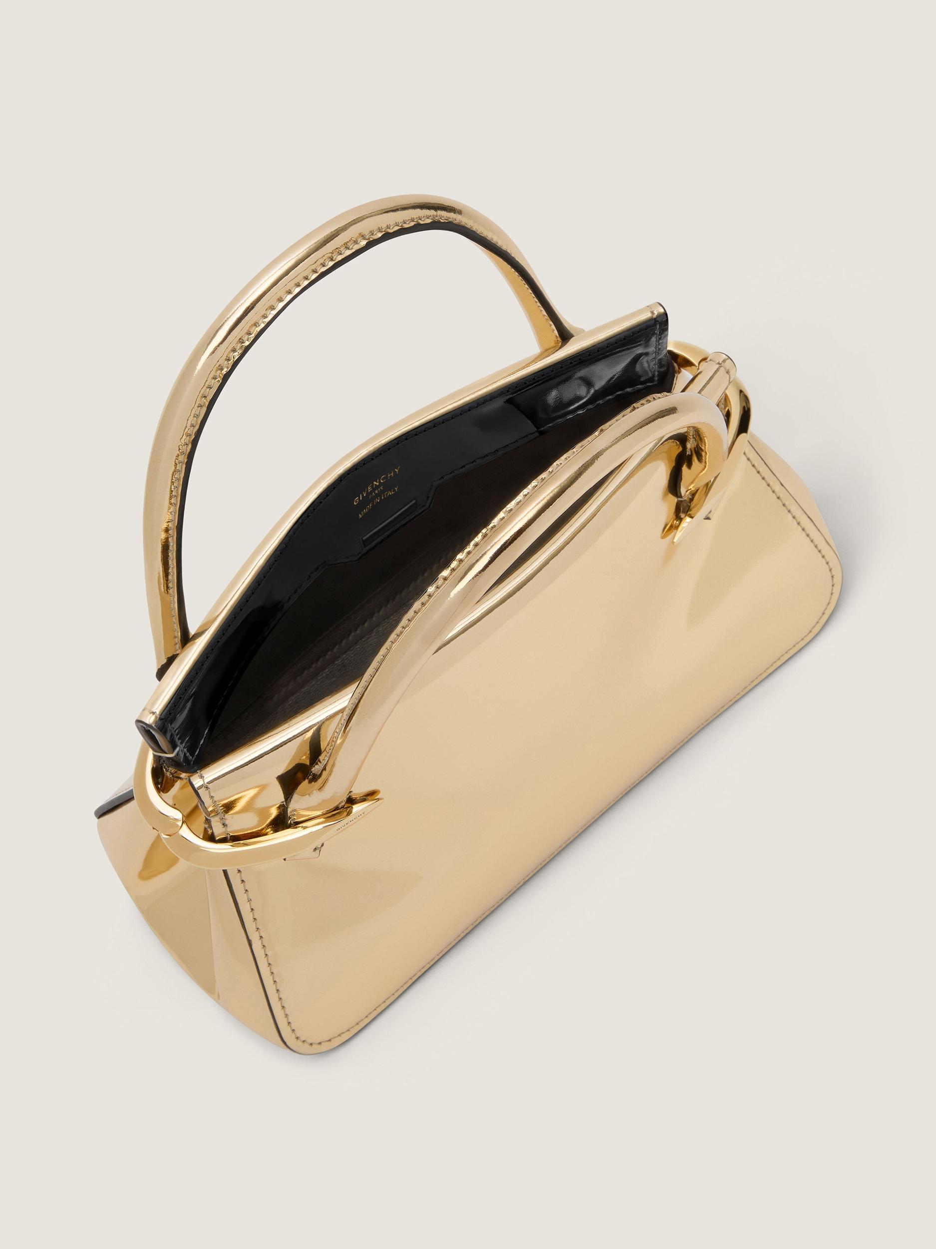 Mini Pinch bag in mirror effect leather Product Image