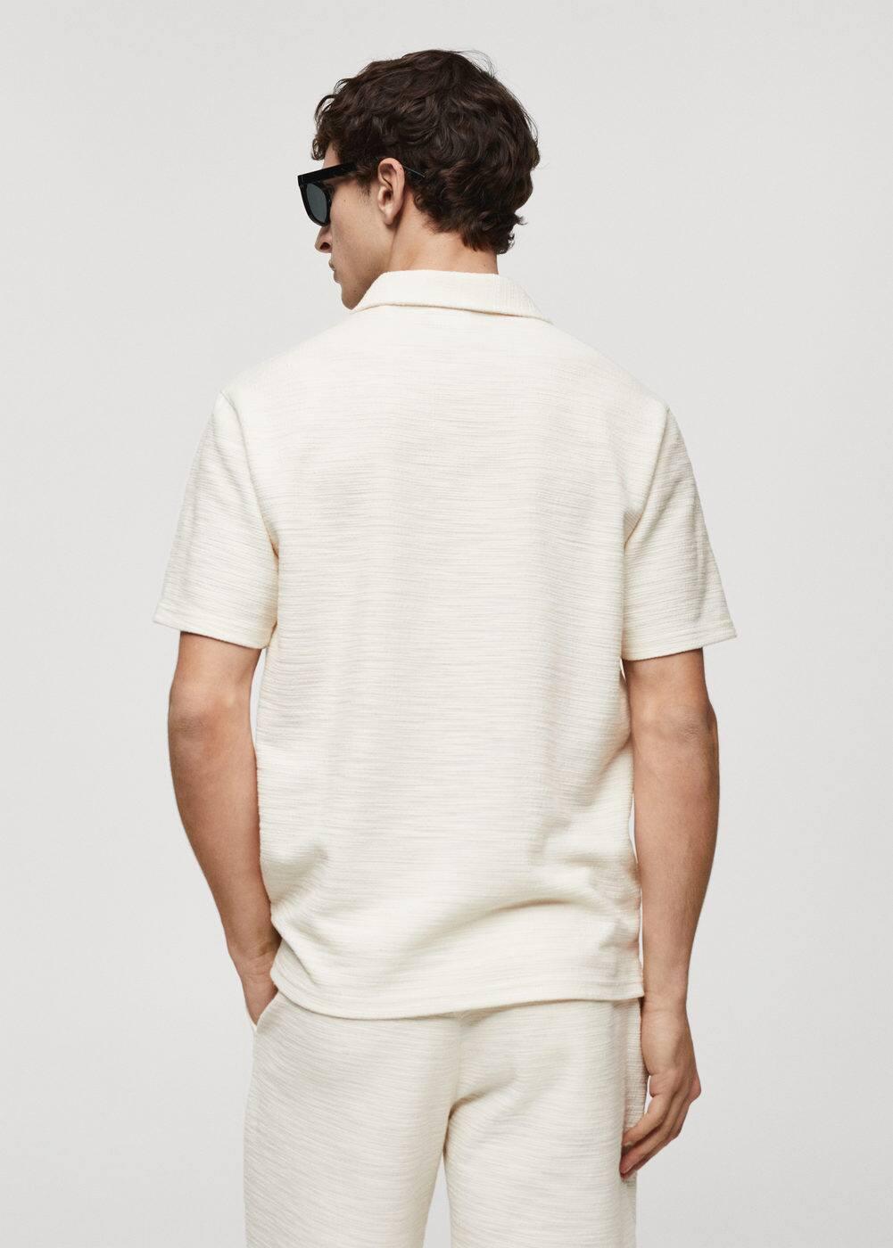 Regular-fit textured knitted polo shirt - Men | MANGO USA Product Image