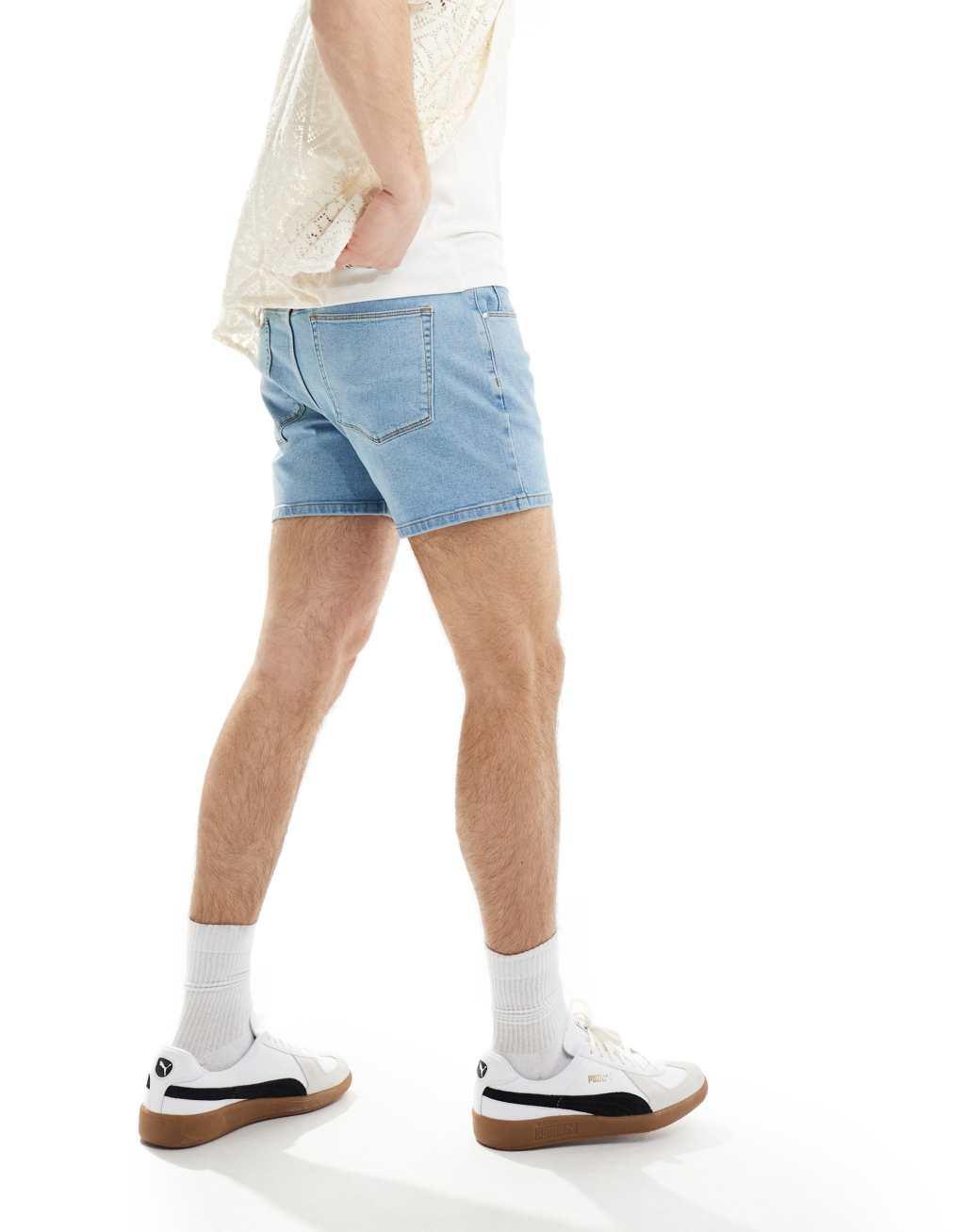 ASOS DESIGN skinny shorter length denim short in light wash blue Product Image