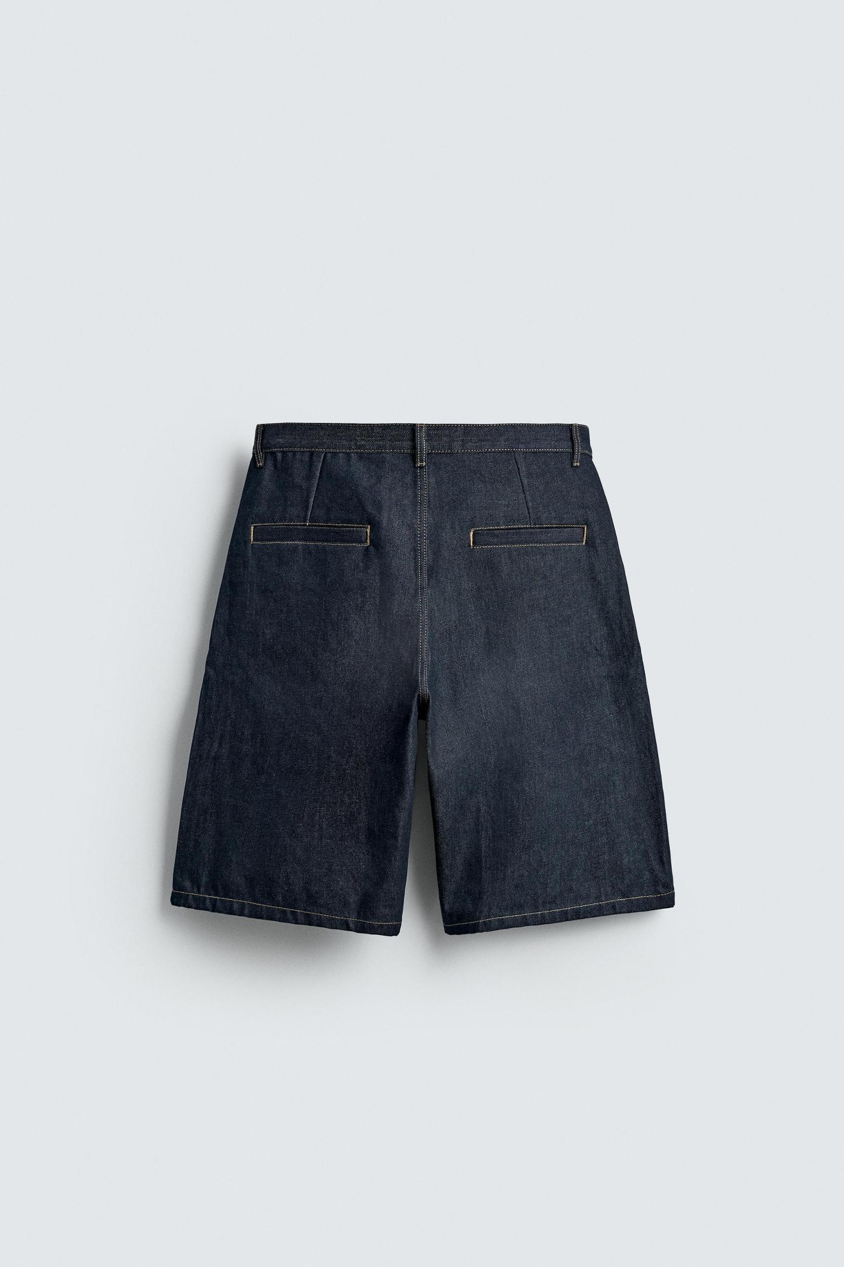 RELAXED FIT PLEATED DENIM SHORTS Product Image
