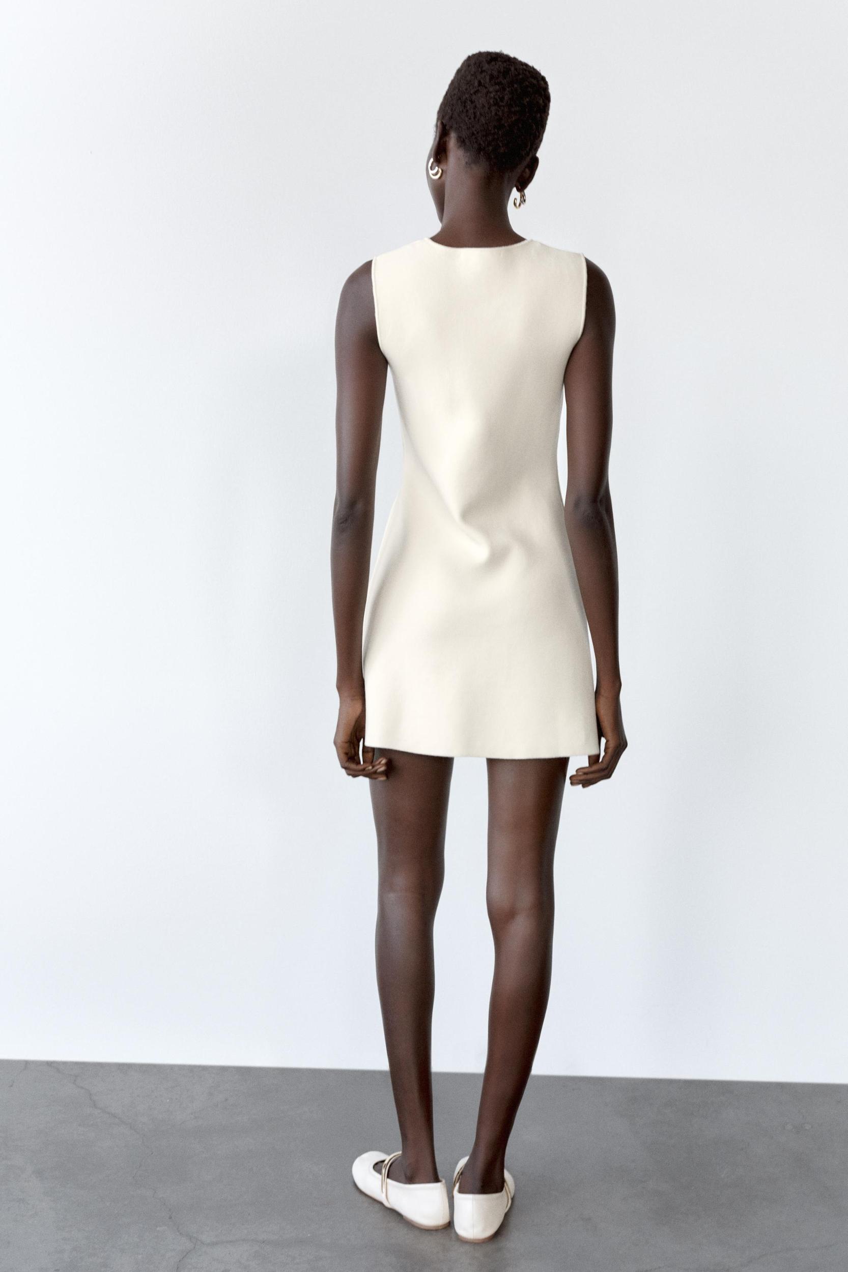 SHORT PLAIN KNIT DRESS Product Image