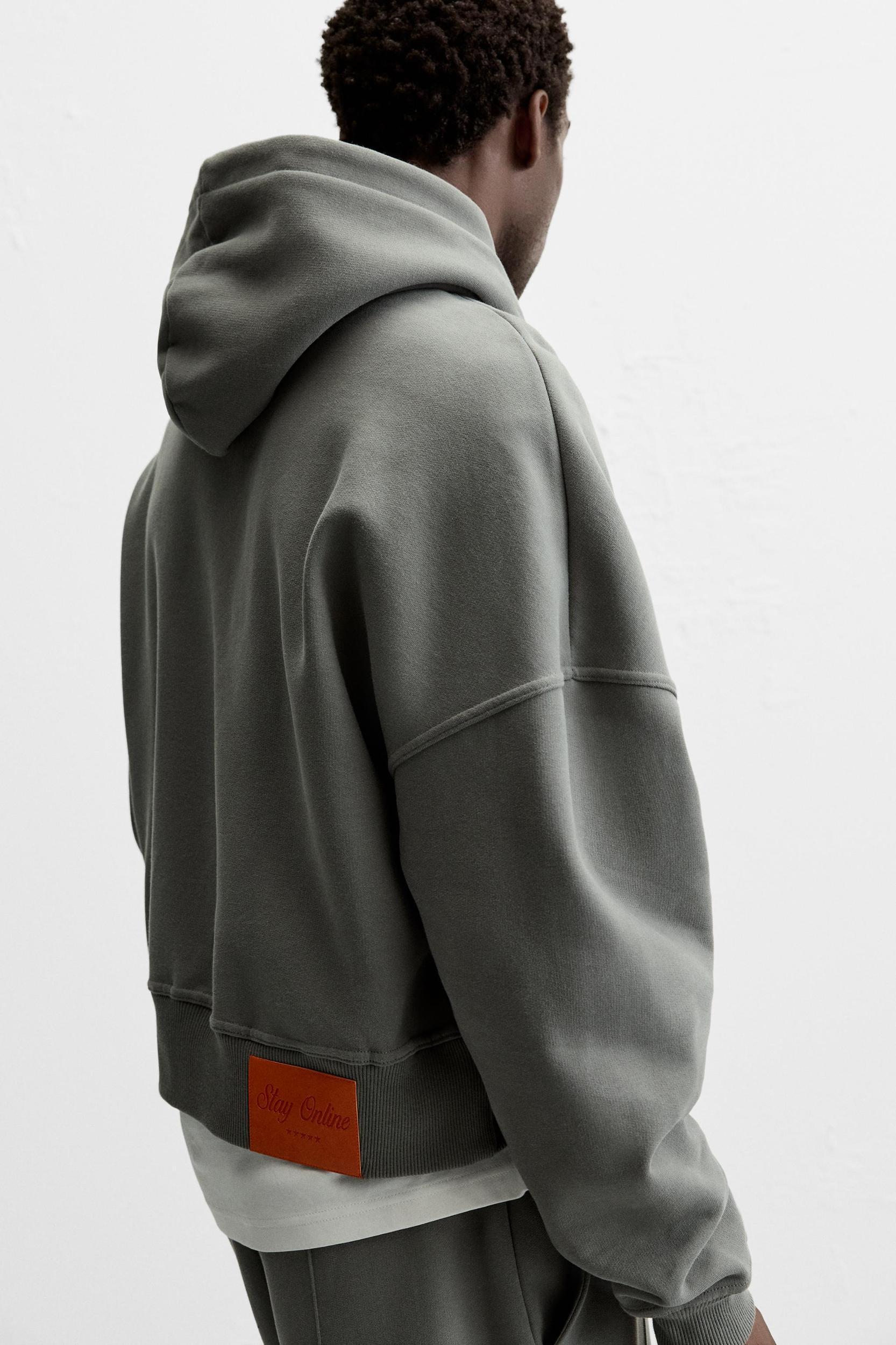 BOXY FIT PATCH SWEATSHIRT Product Image