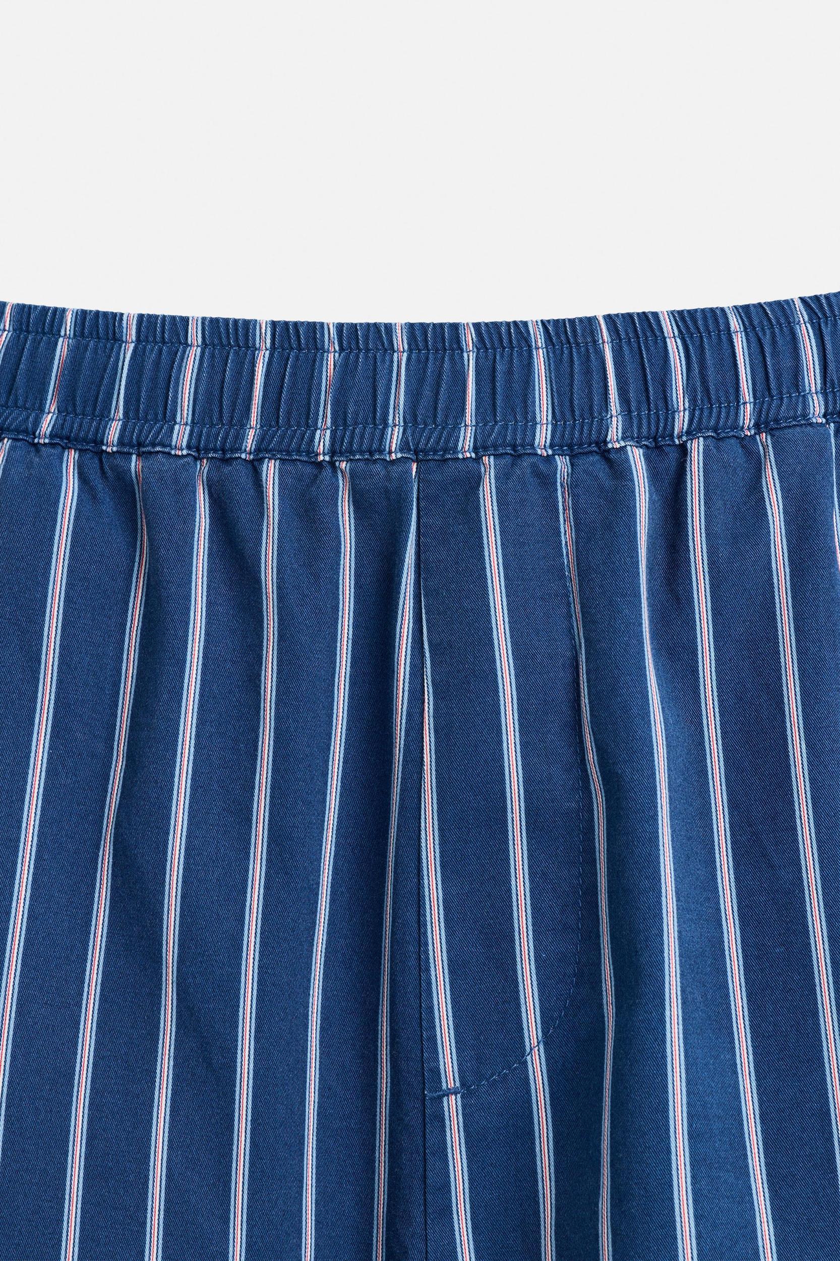 STRIPED RELAXED FIT PANTS Product Image