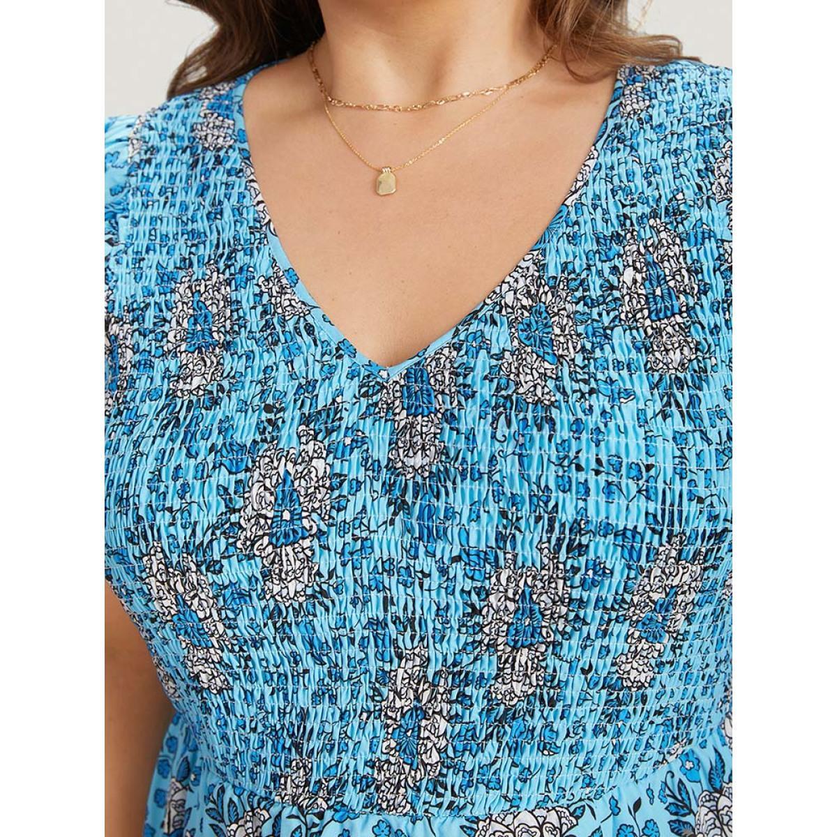 Plus Size Floral Print Shirred Ruffle Cap Sleeve Layered Hem Dress Cerulean Women Elegant Shirred V-neck Cap Sleeve Curvy Knee Dress BloomChic 18-20/2X Product Image