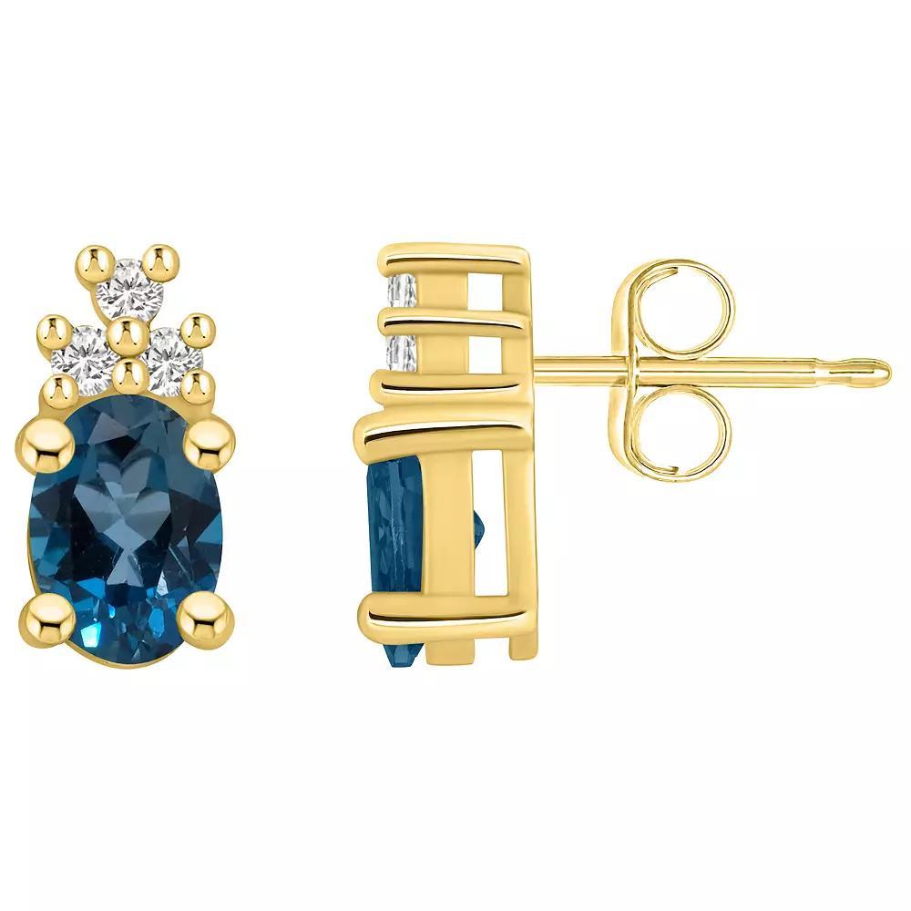 Alyson Layne 14k Gold Oval London Blue Topaz & 1/7 Carat T.W. Diamond Earrings, Women's Product Image