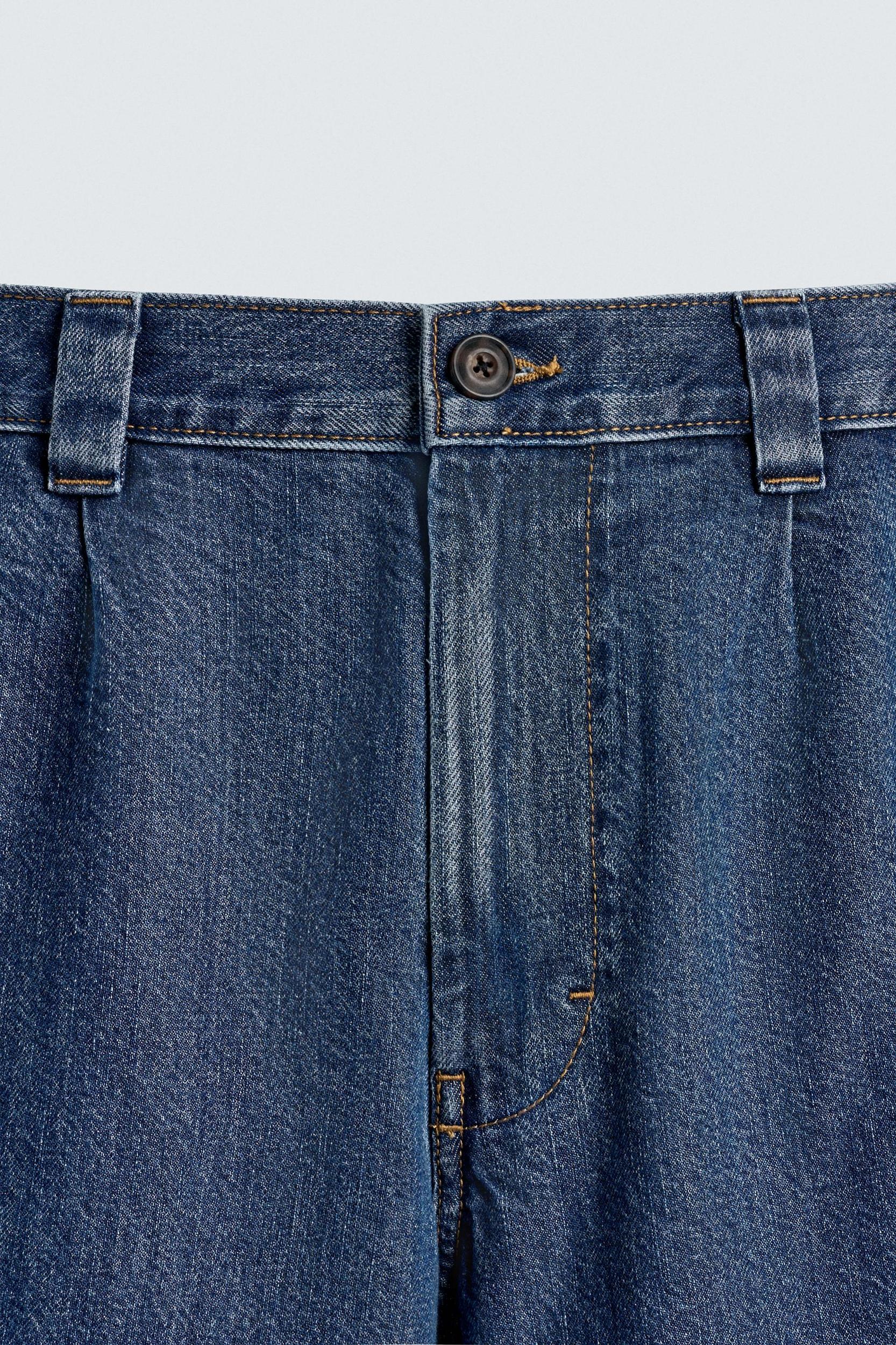 PLEATED RELAXED FIT DENIM SHORTS Product Image