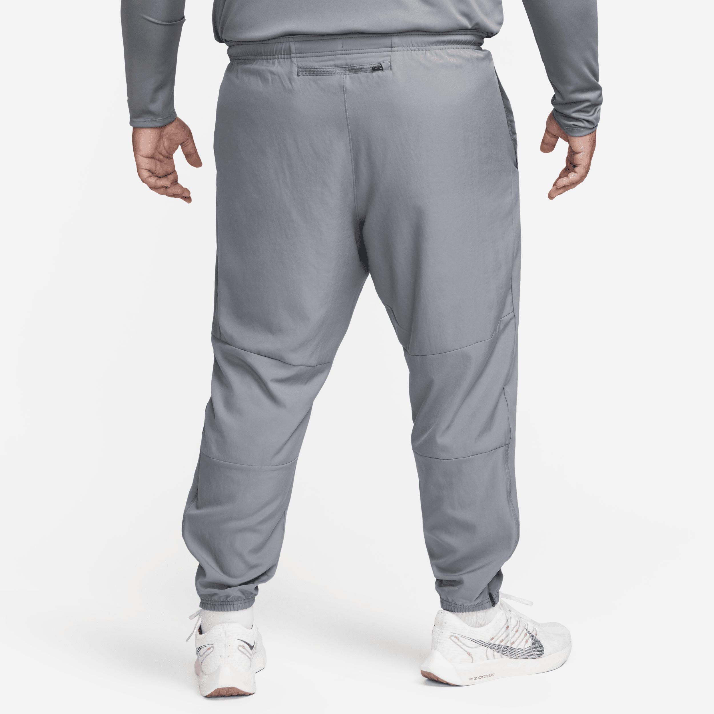 Nike Men's Challenger Dri-FIT Woven Running Pants in Grey/Smoke Grey Size Medium Polyester Product Image
