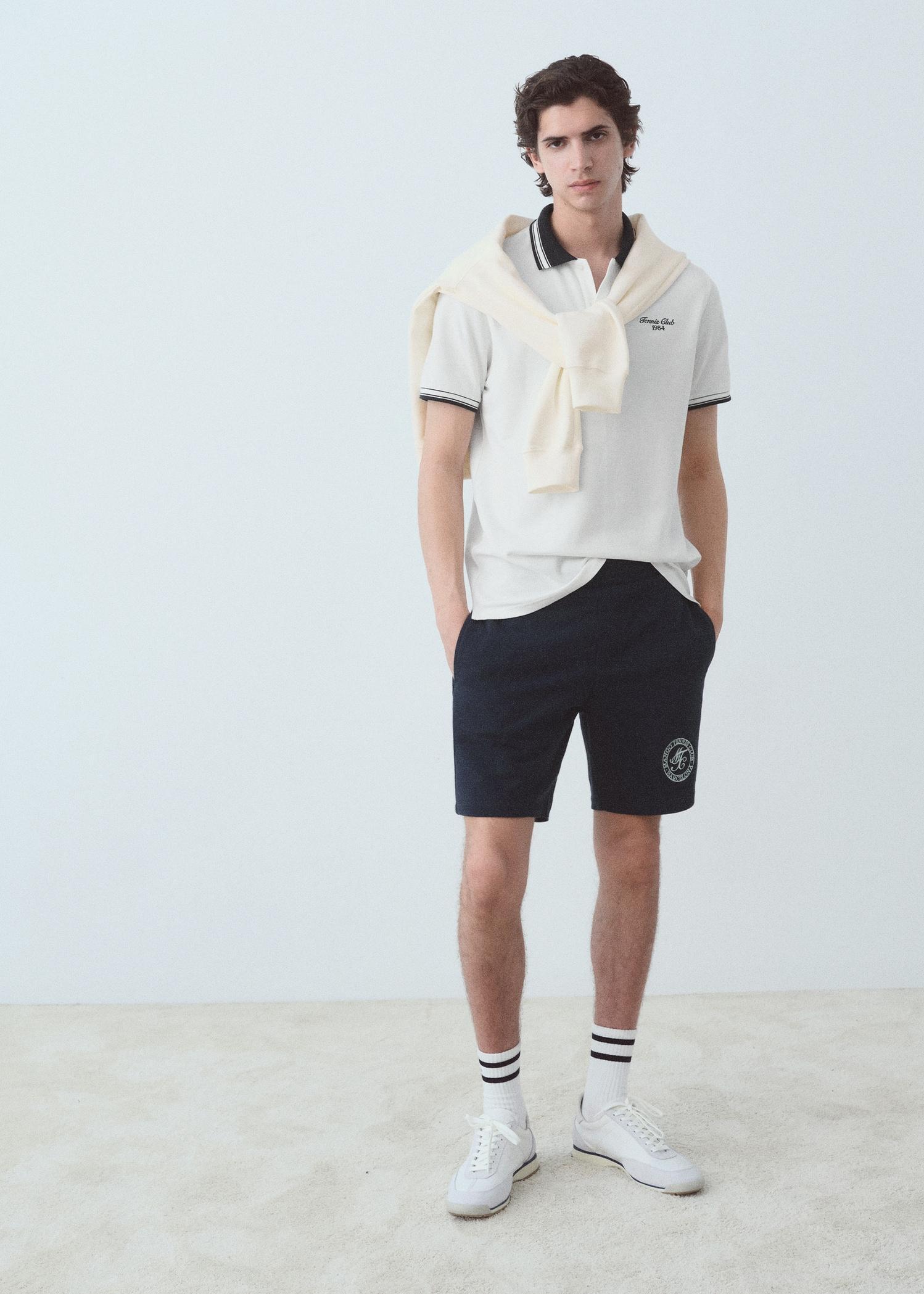 Contrasting neck cotton polo shirt - Men | MANGO USA Product Image