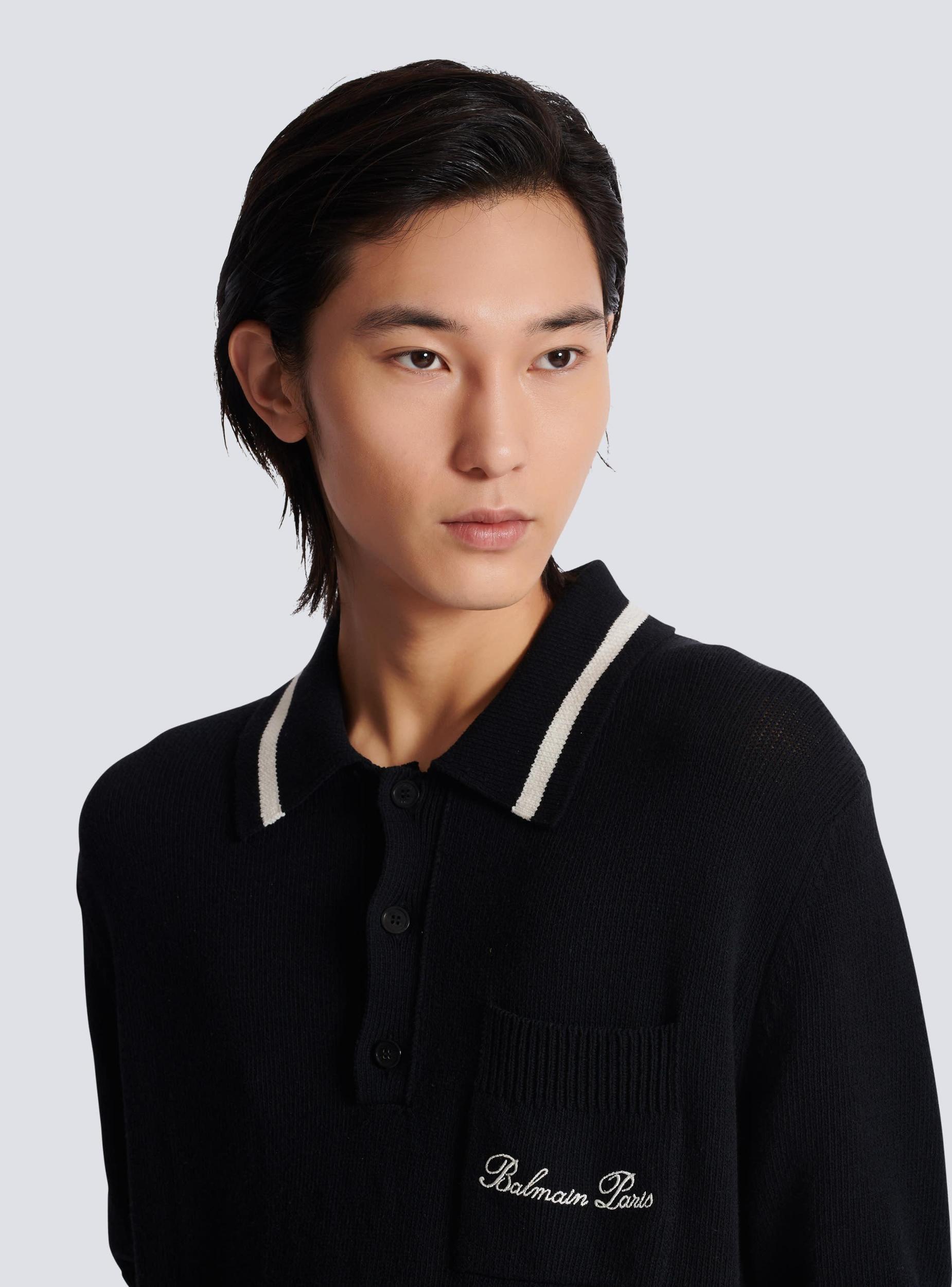 Wool polo shirt with Balmain Signature embroidery Product Image