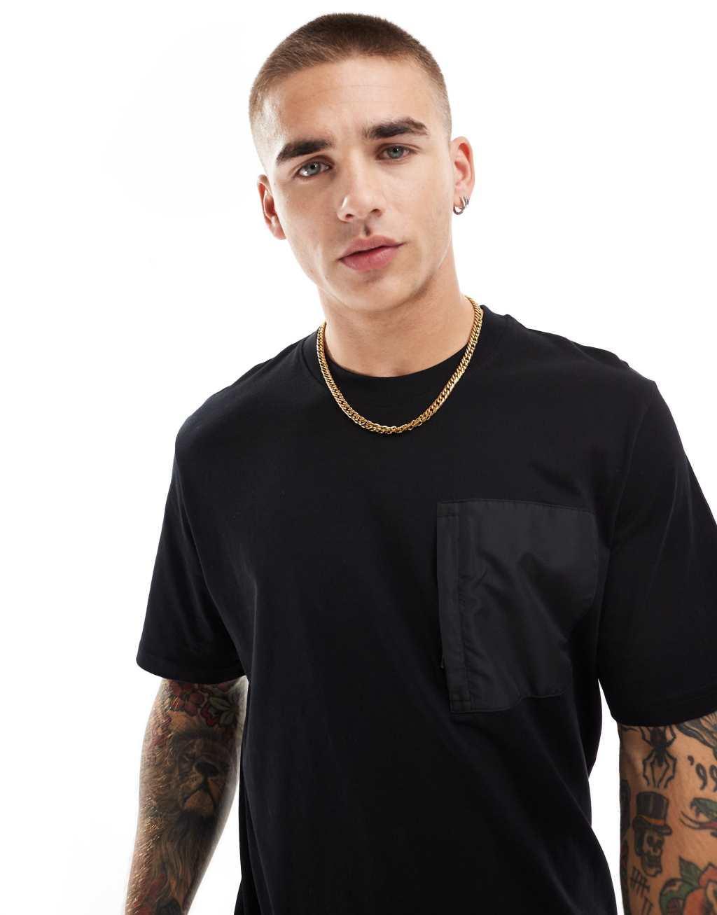 Jack & Jones oversized t-shirt with nylon pocket in black Product Image