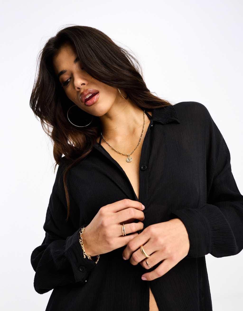 ASOS DESIGN crinkle beach shirt in black Product Image