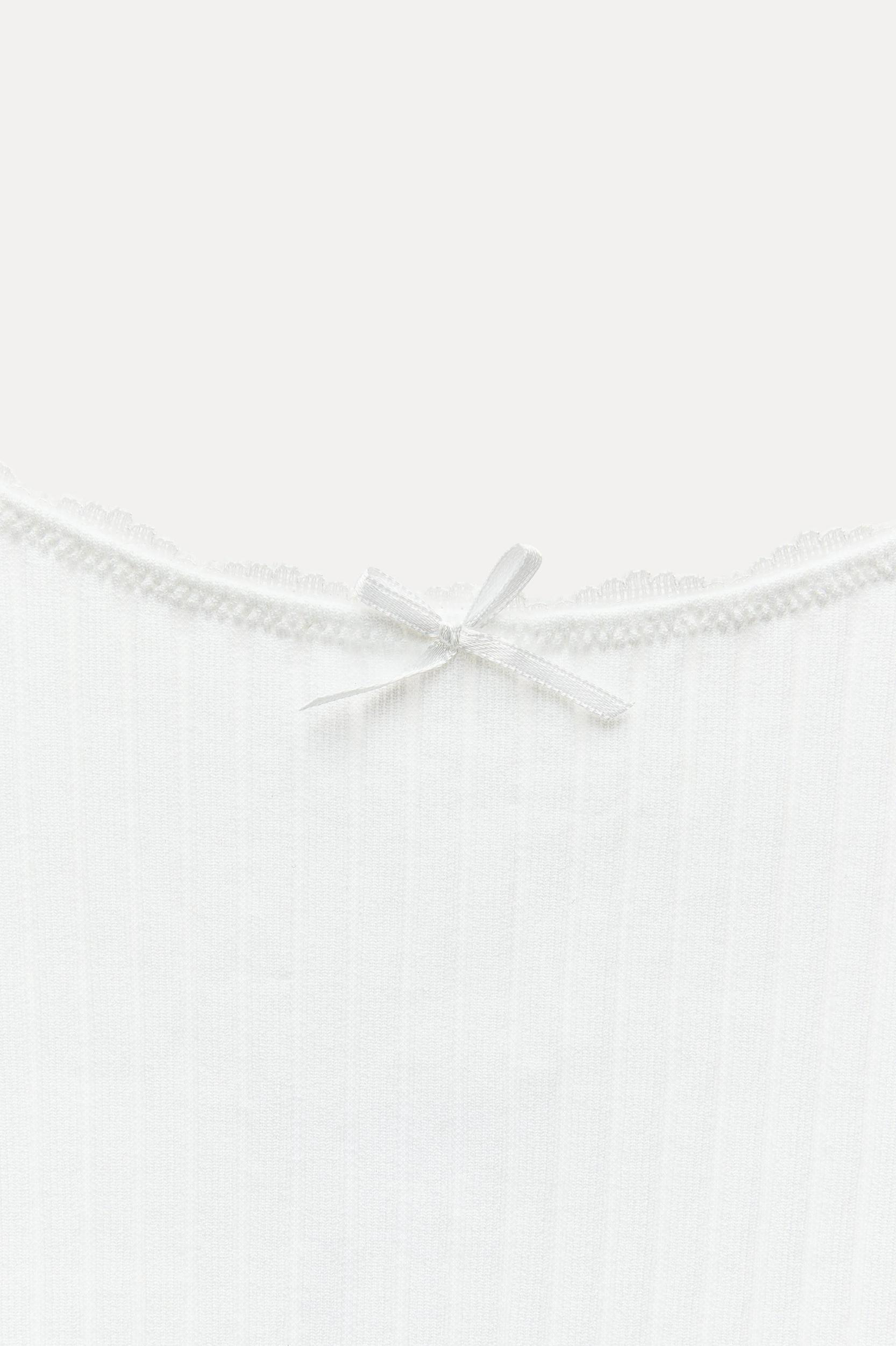 SEAMLESS RIB BOW CROP TOP Product Image