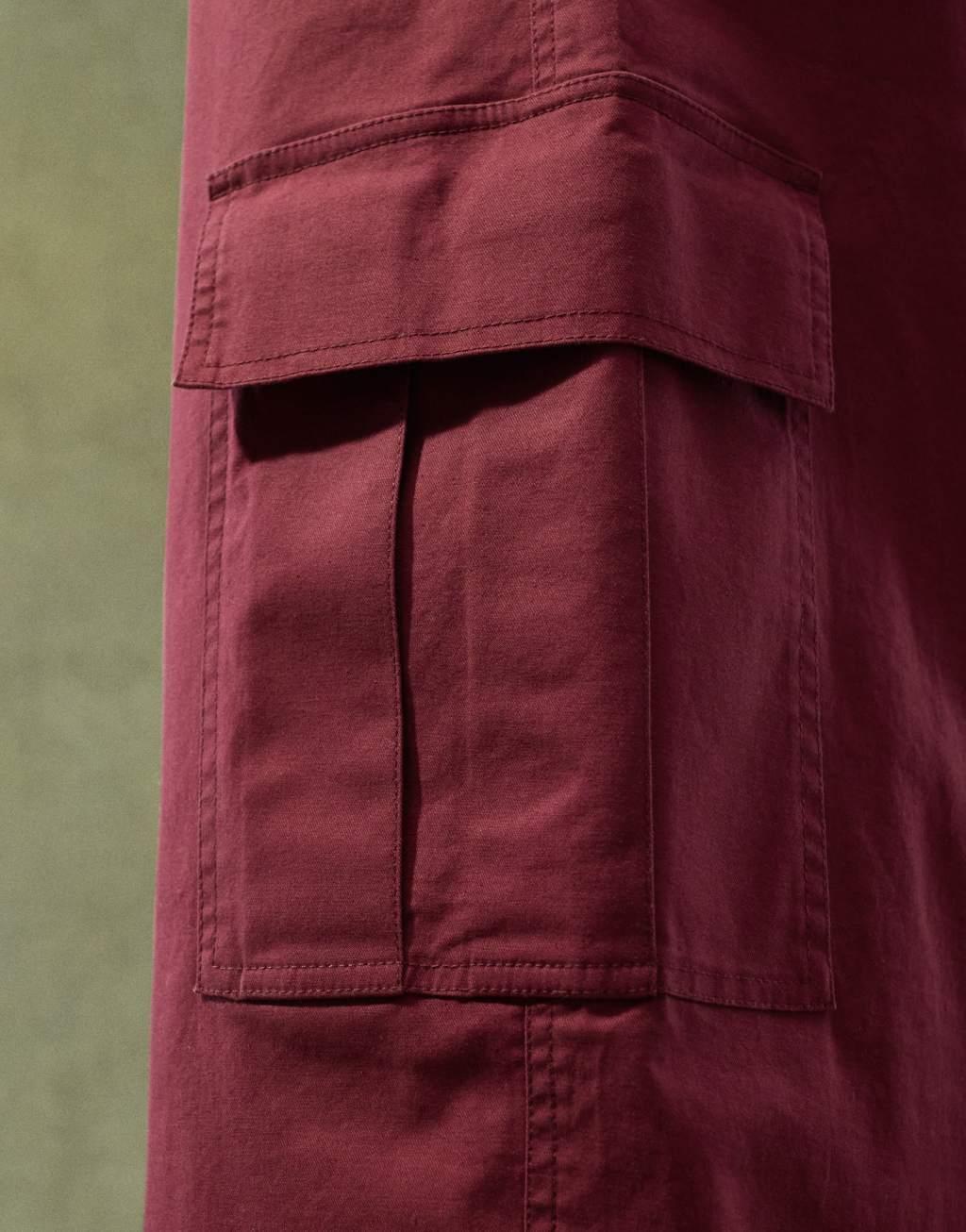 ASOS DESIGN super baggy cargo pants with elastic waist in burgundy Product Image
