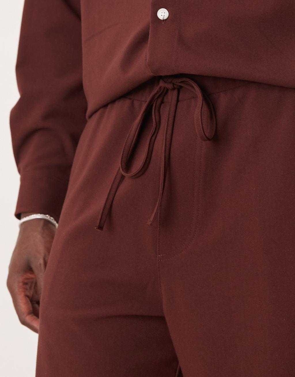 ASOS DESIGN baggy pants in brown - part of a set Product Image