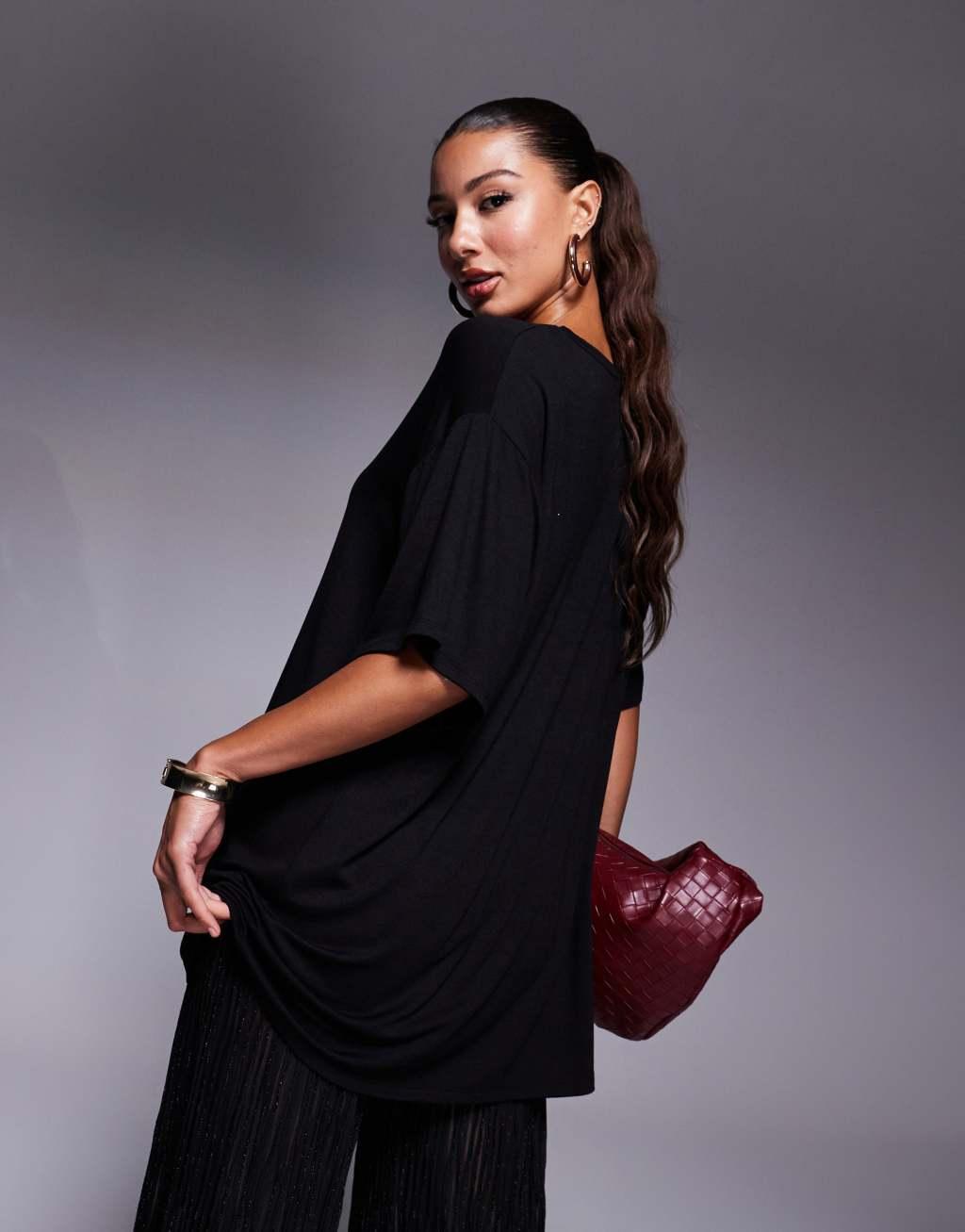 ASOS DESIGN 2 in 1 oversized t-shirt jumpsuit with metallic plisse pants in black Product Image