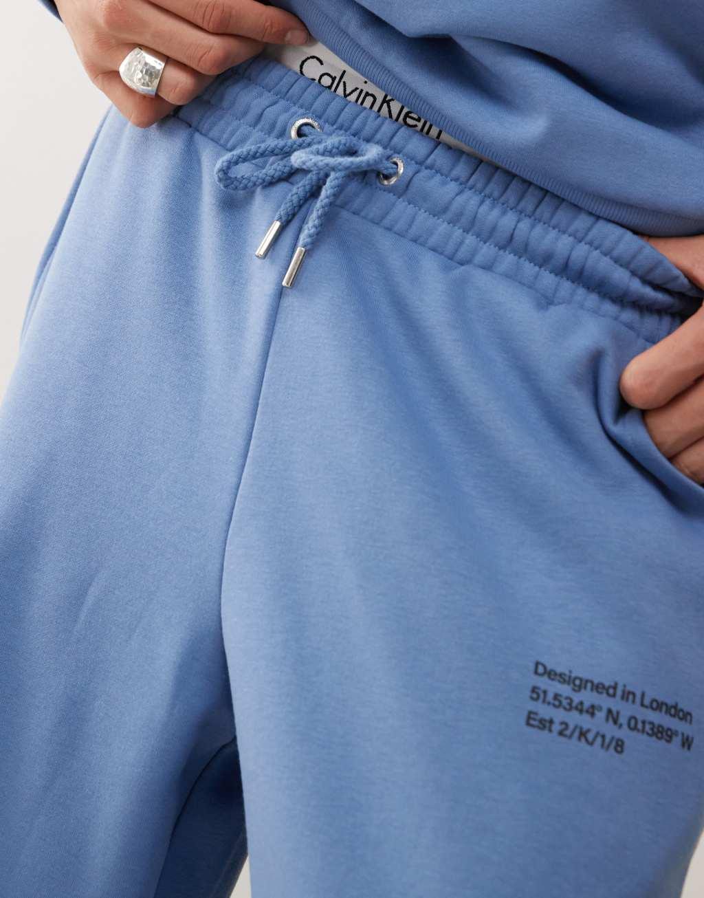 COLLUSION Relaxed skate sweatpants in blue - part of a set Product Image