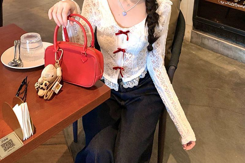 Long-Sleeve Peter Pan Collar Bow Accent Slit Lace Crop Blouse Product Image