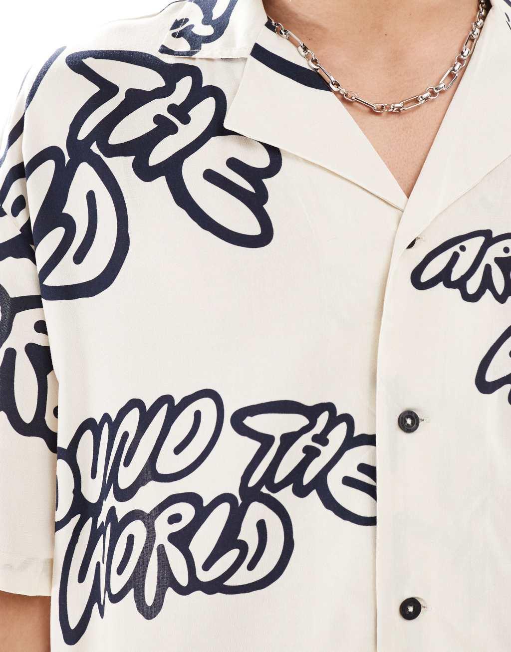 Dr Denim Madi short sleeve relaxed fit summer shirt with navy graphics in ecru exclusive to ASOS Product Image
