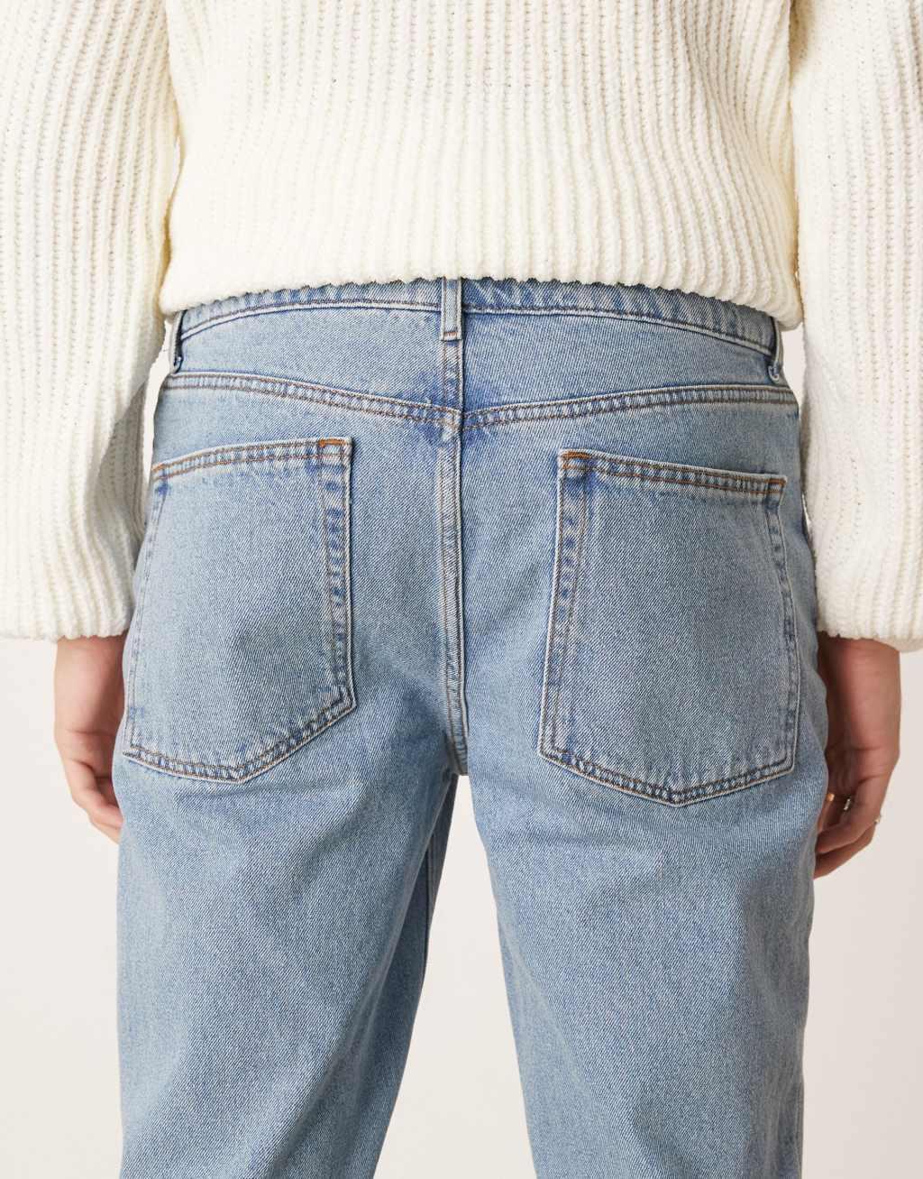 ASOS DESIGN Essential straight leg jeans in mid wash blue Product Image