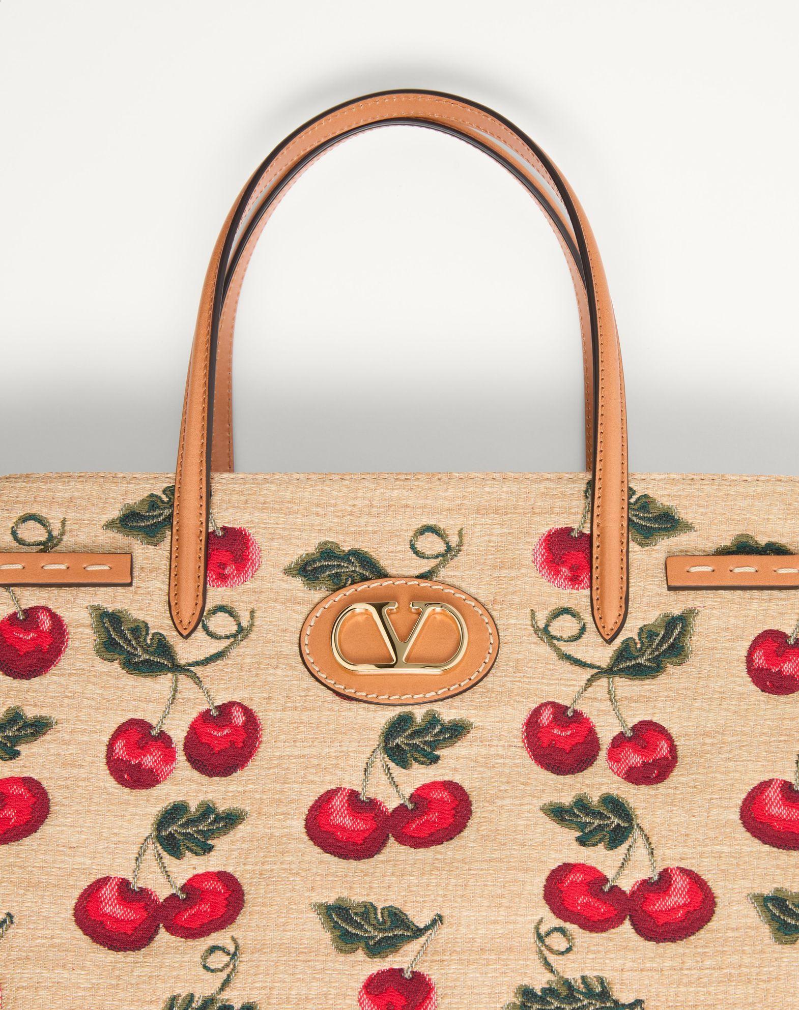 Valentino Garavani Antibes Medium Shopping Bag In Jacquard Raffia With Cherryfic Motif Product Image