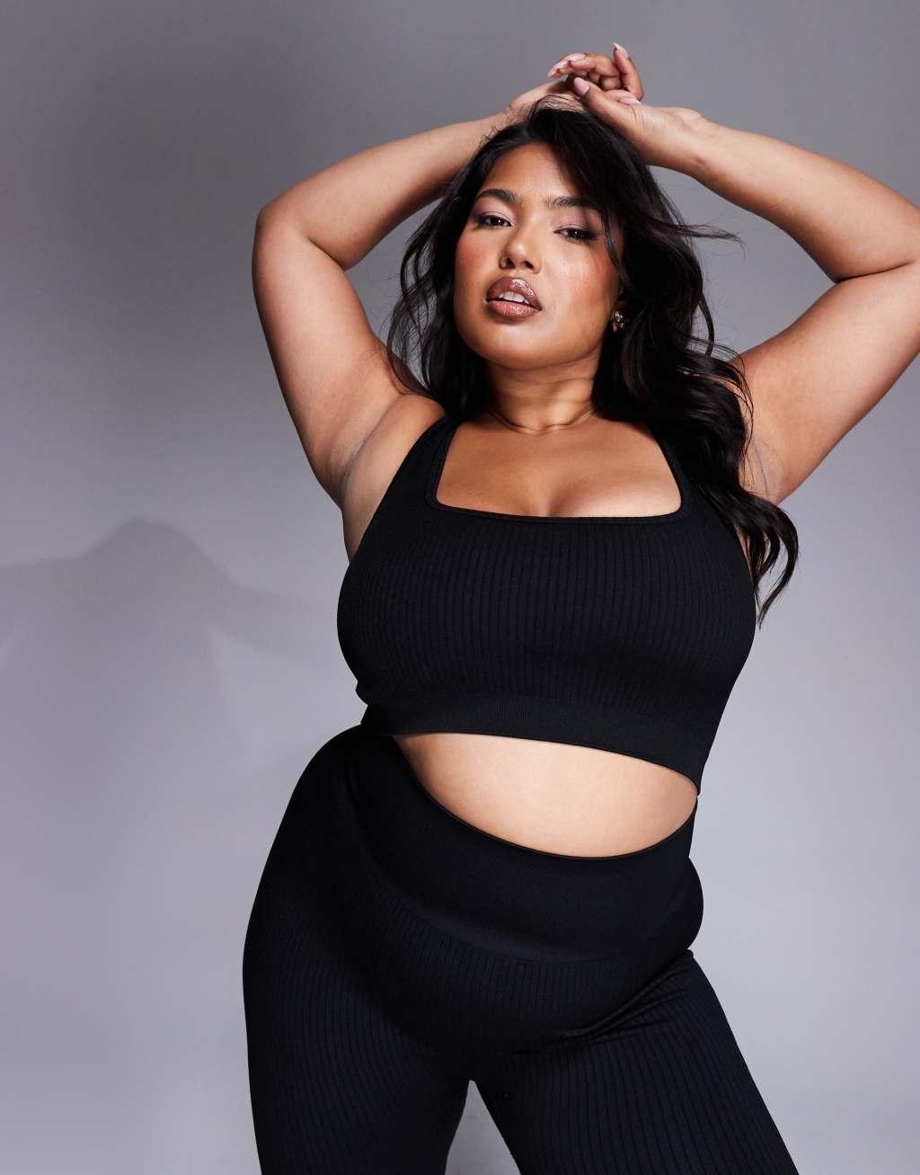 4505 Curve Icon mid impact seamless rib knit sports bra with square neck in black  Product Image