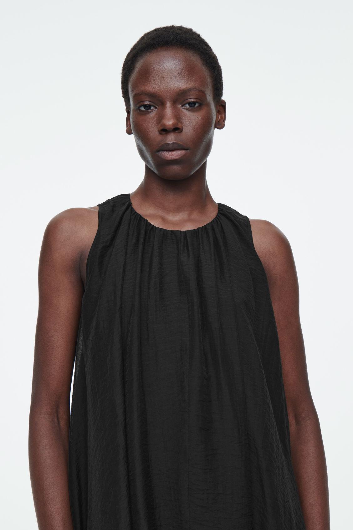 BUBBLE-HEM MINI DRESS Product Image