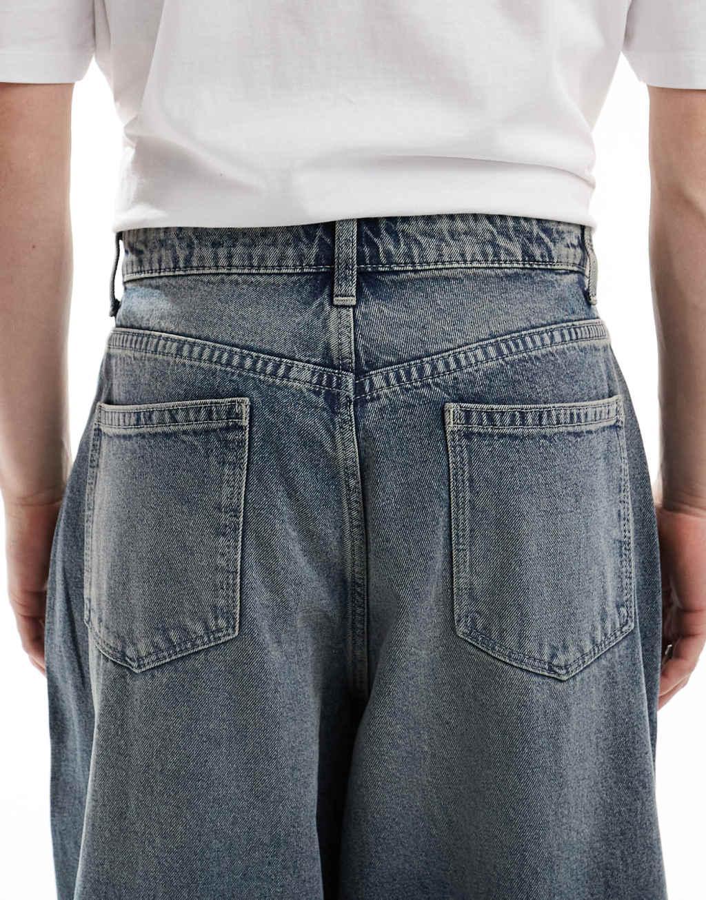 ASOS DESIGN oversized baggy fit jeans in vintage light wash blue Product Image