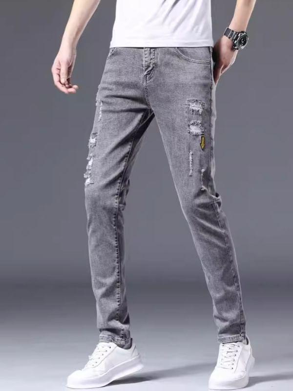 Mid Rise Washed Distressed Slim Fit Jeans Product Image