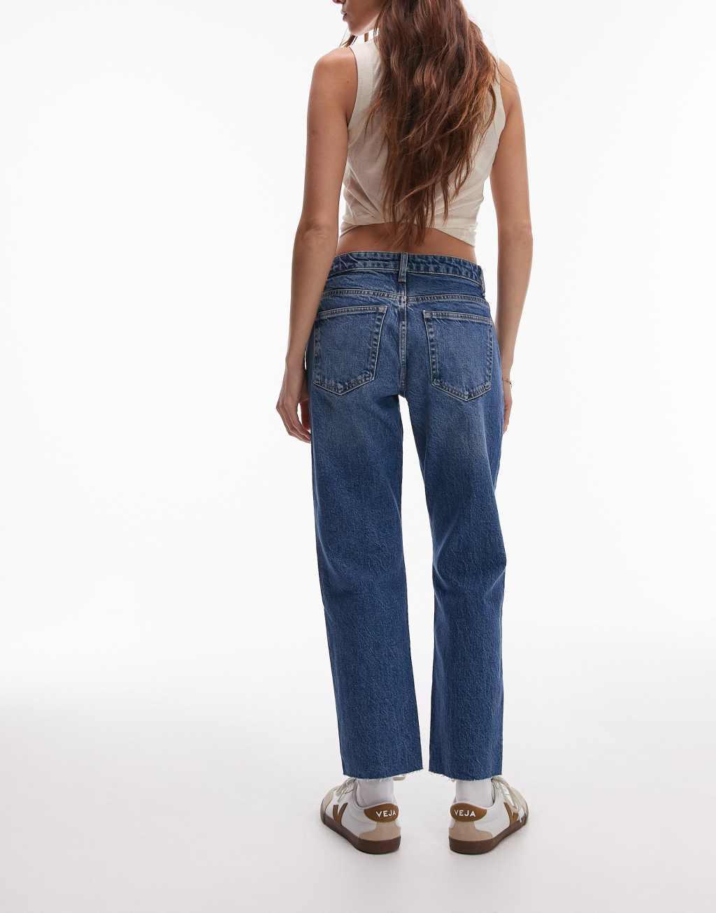 Topshop cropped mid rise straight jeans with raw hems in mid blue  Product Image