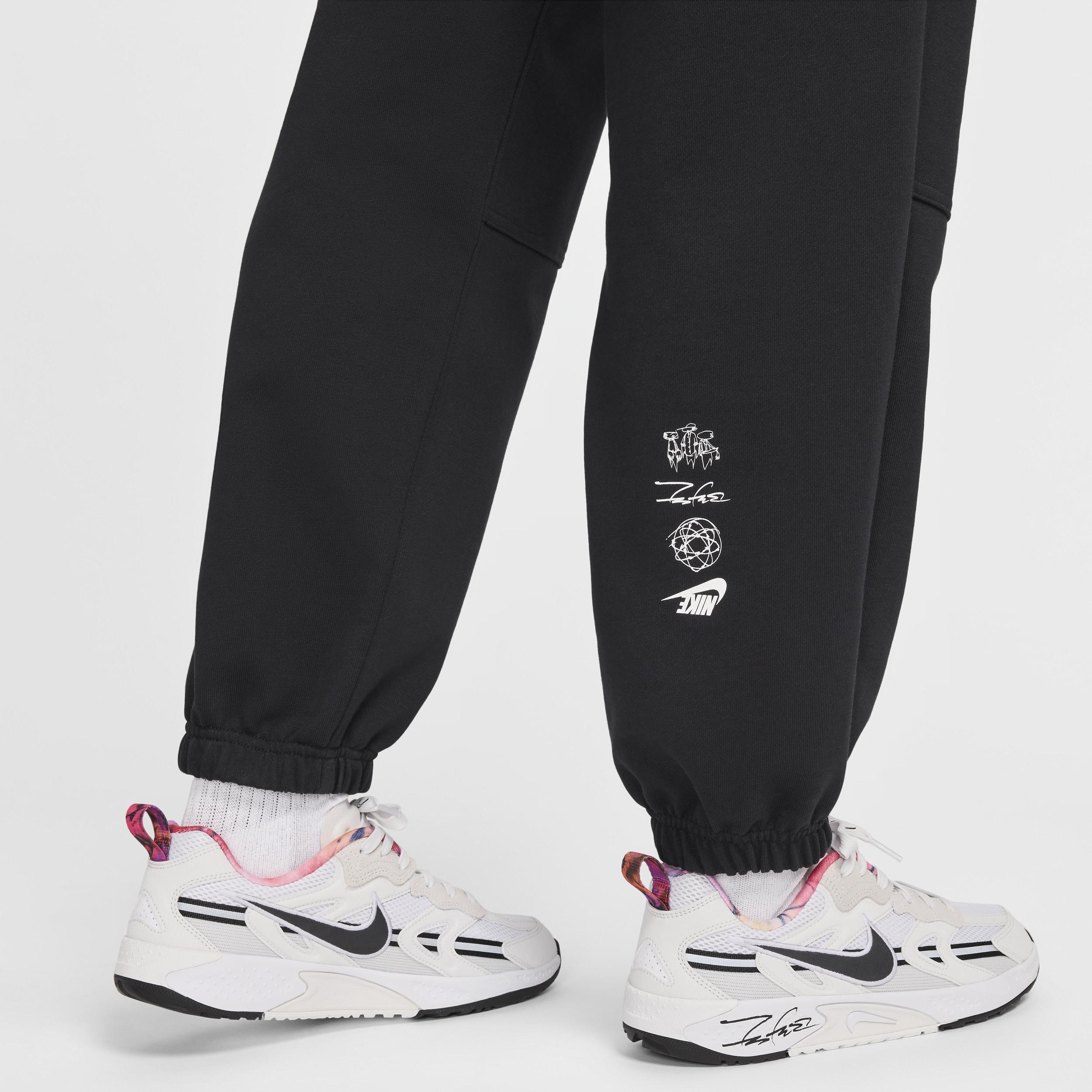 Nike Sportswear Breaking Women's Mid-Rise Oversized French Terry Pants Product Image